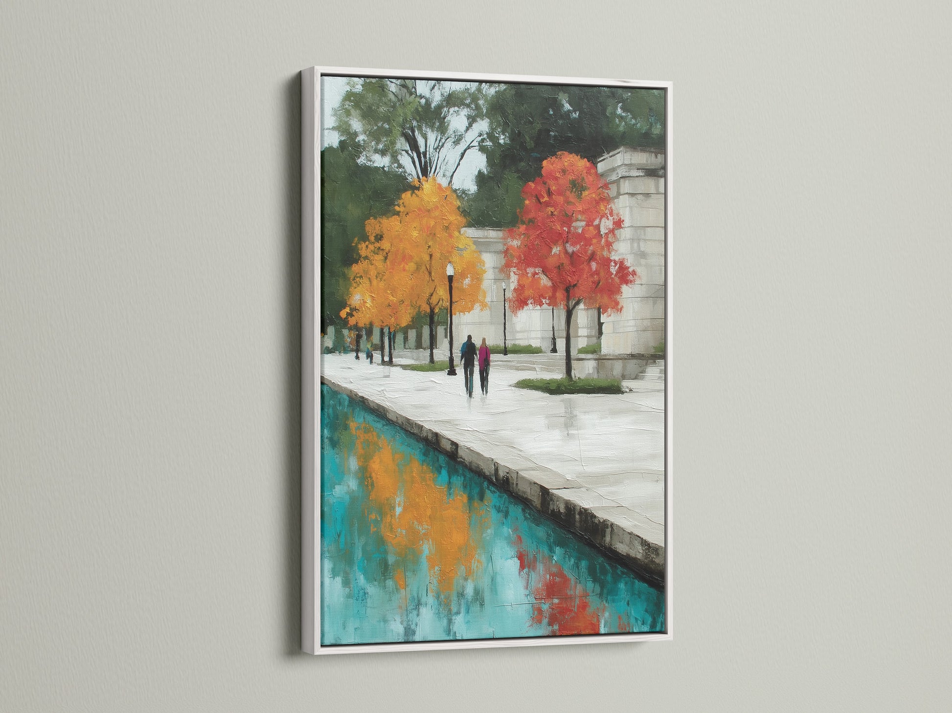 Admire this urban canal artwork. It is displayed in a white frame. The white frame creates a clean and modern look. The art features autumn trees and teal water. Ideal for brightening up an office. This artwork adds a touch of sophistication. It brings a contemporary feel to your decor.
