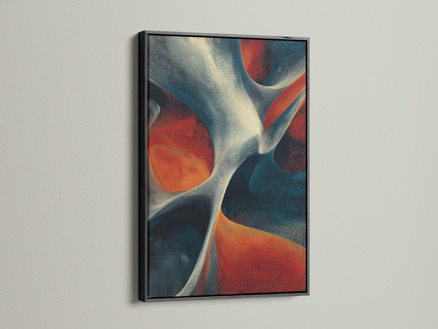 Artwork with a black frame on a white wall. The artwork features abstract shapes in red white and blue. The black frame provides a bold and contemporary feel. This framed art is a striking addition to any wall. It will definitely catch the eye.