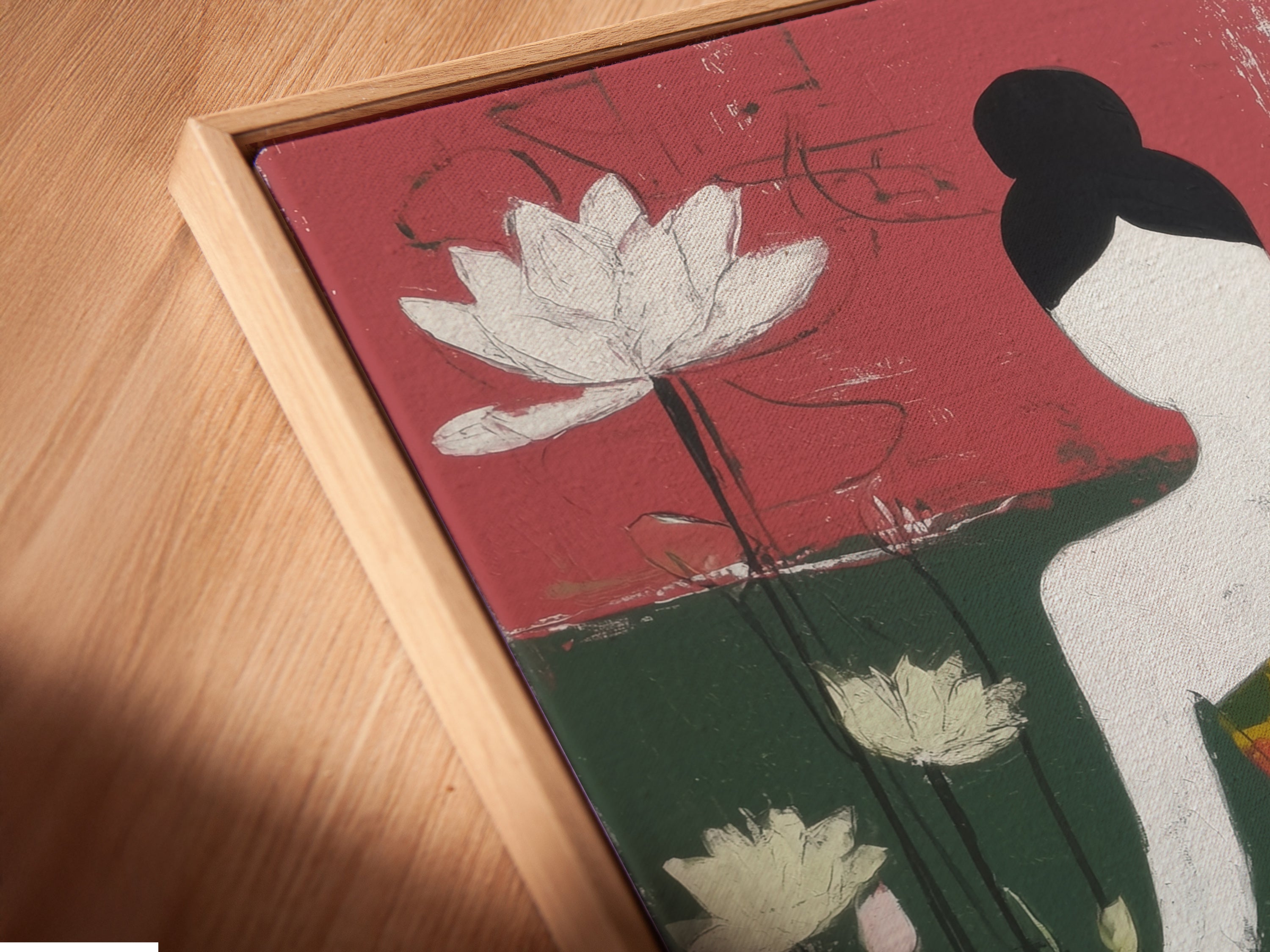 A close-up angled view shows a canvas print in a floating frame. The meditation art features a Buddha figure and lotus flowers. The floating frame enhances the artwork's contemporary style. It's ideal for yoga studios and meditation rooms. This is a serene wall art choice.