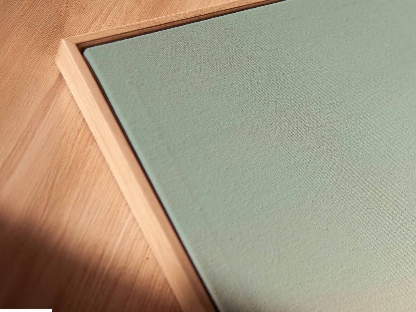 Close-up of a canvas print. This is in a floating frame. The frame enhances the artwork. Explore canvas prints in floating frames. Get a modern look for your art. Shop now to elevate your space.