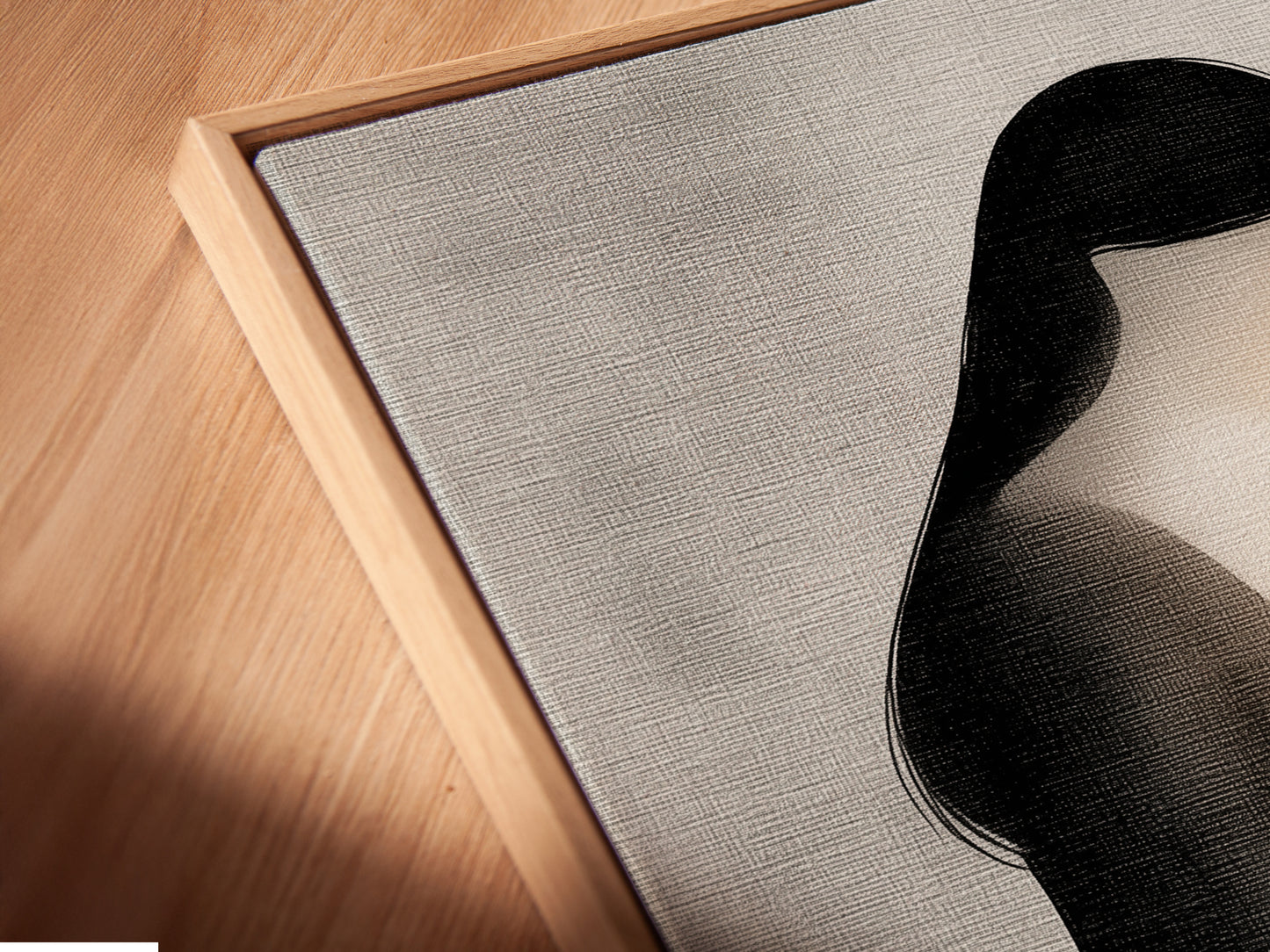 Angled close up of a canvas print featuring minimalist woman reading artwork in a floating frame. This fine art piece adds elegance to any room. Perfect for study room decor and creating a quiet space.