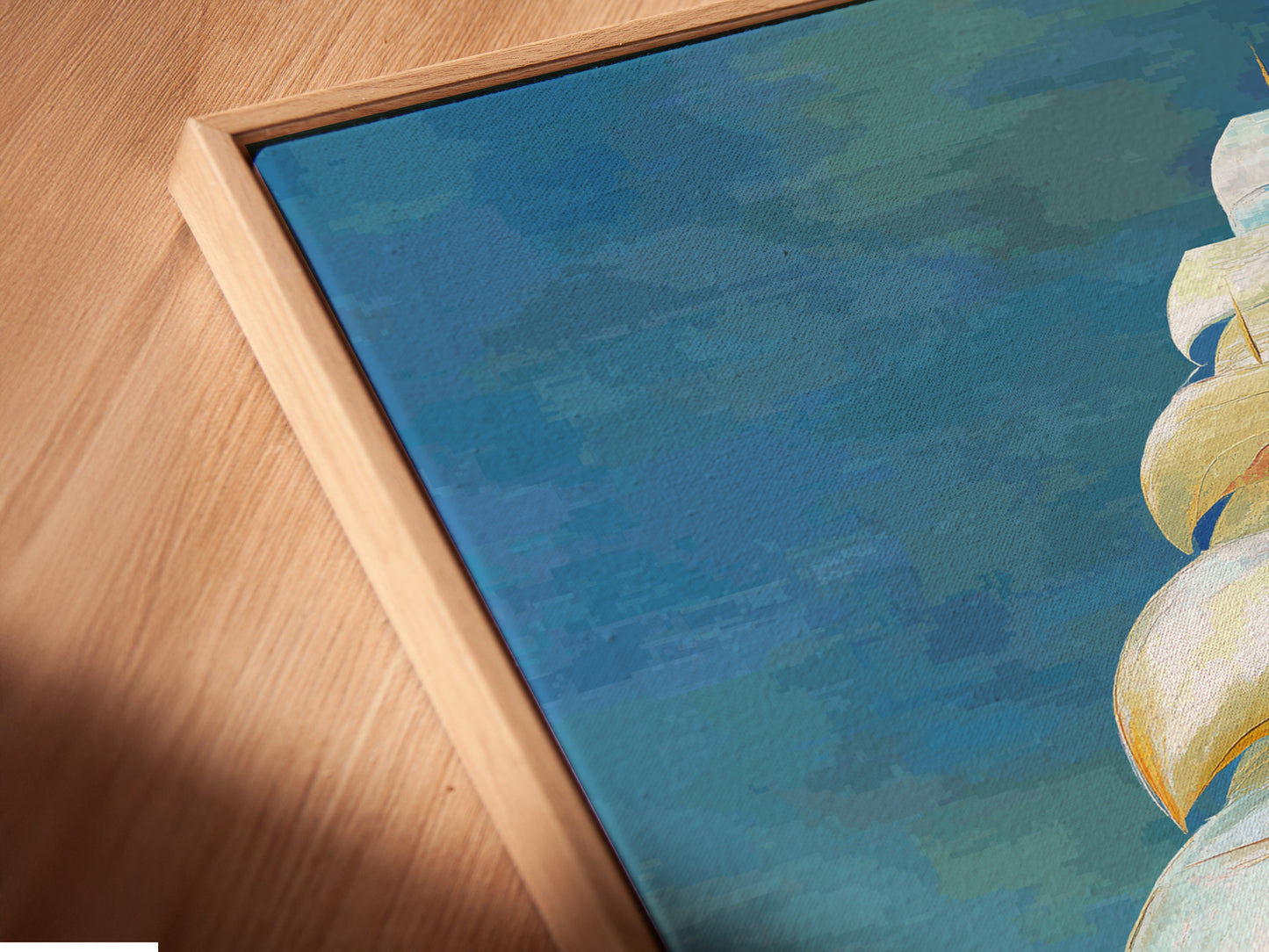 A close-up angled view of a canvas print in a floating frame. The abstract sailboat artwork is beautifully presented. The floating frame gives the art a modern look. The canvas texture enhances the nautical print. This piece elevates any coastal wall decor.