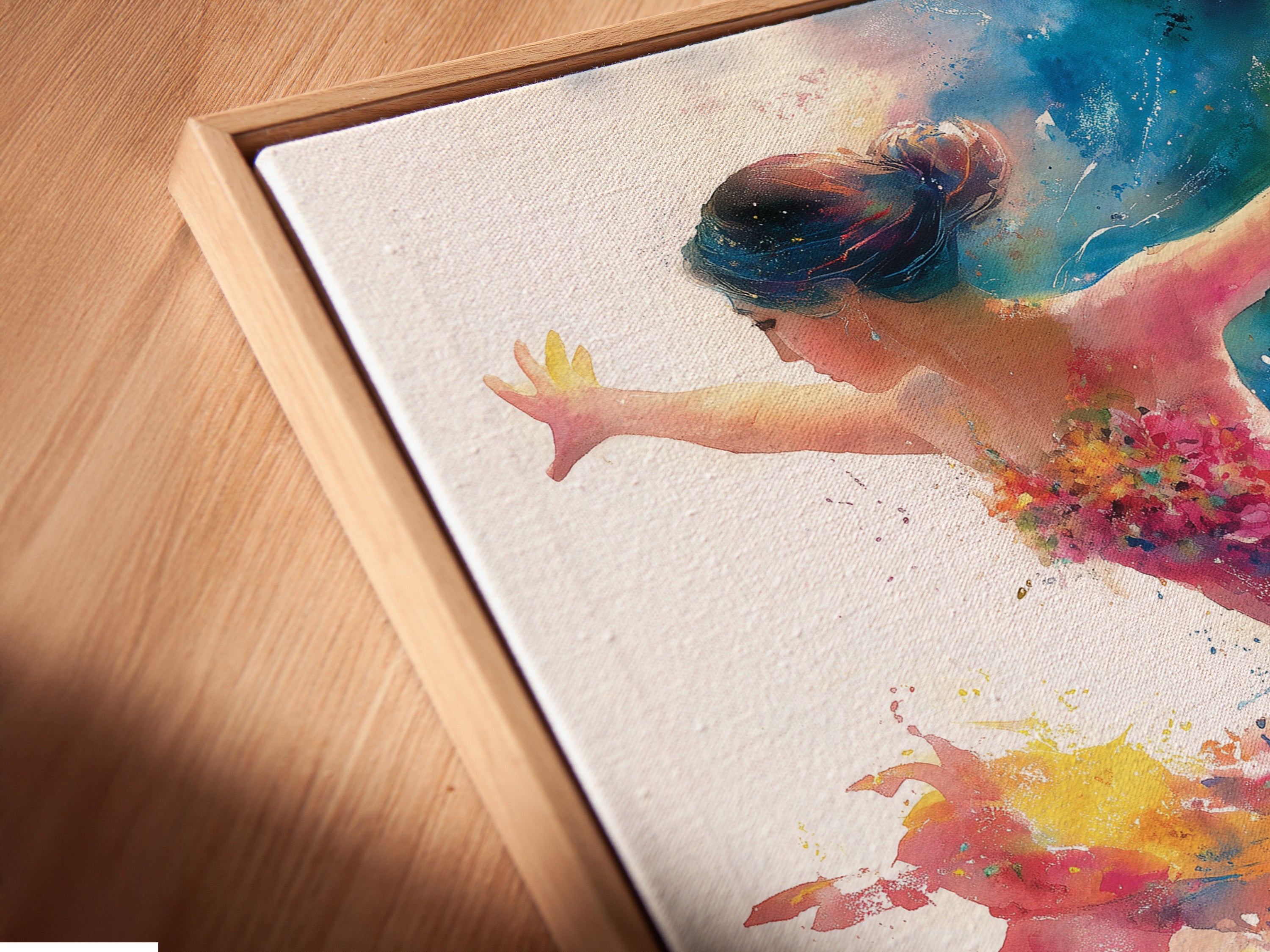 A close-up angle highlights a canvas print in a floating frame. The artwork features a dancer creating a watercolor motion print. This figure art print is ideal for dance studio decor. Its contemporary style adds a modern touch.