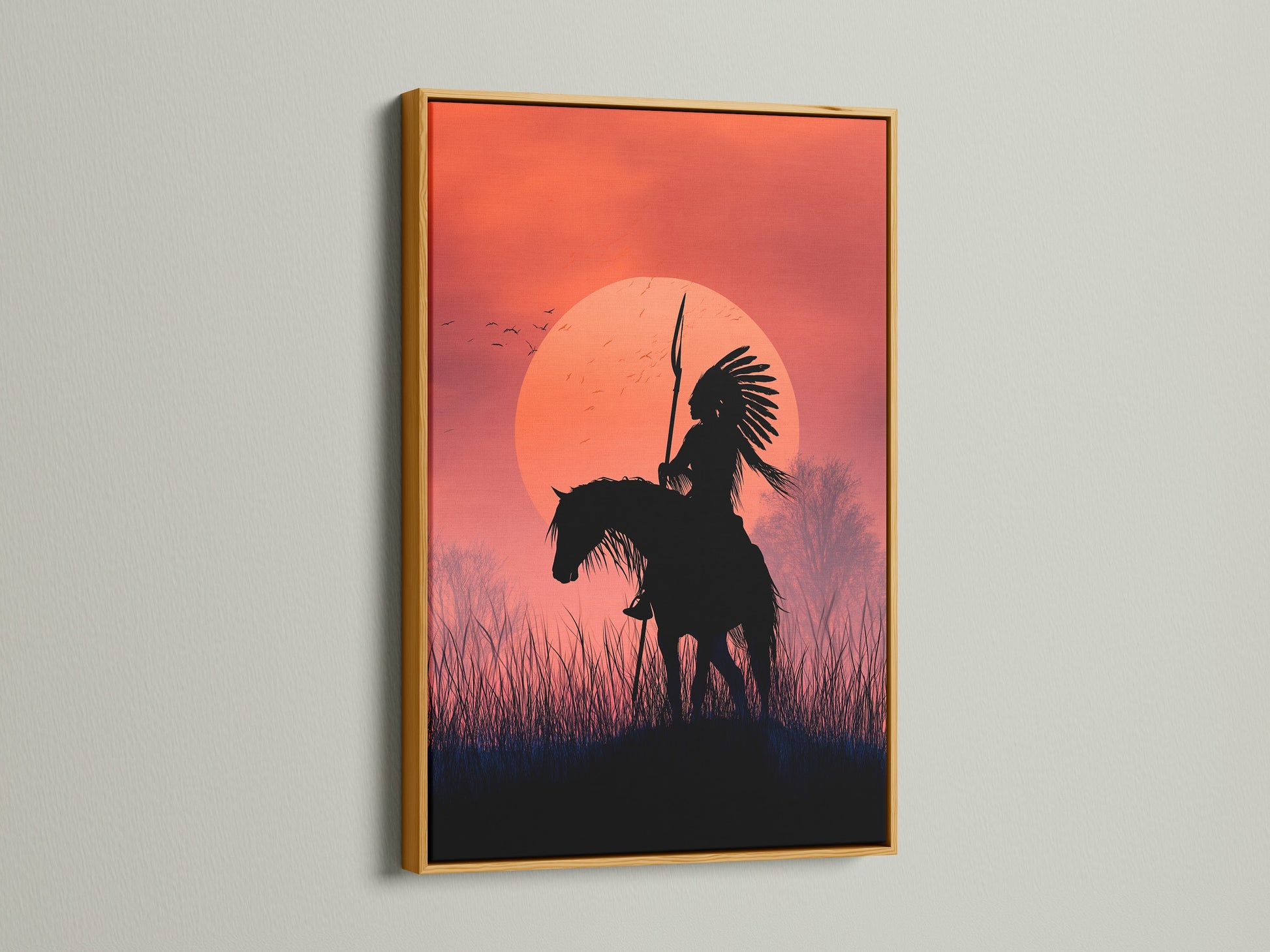 Native American Warrior artwork in a gold frame. This canvas art features a striking horseback rider silhouette against a sunset. Add a touch of tribal elegance to your wall with this western art print. Ideal for southwestern decor.
