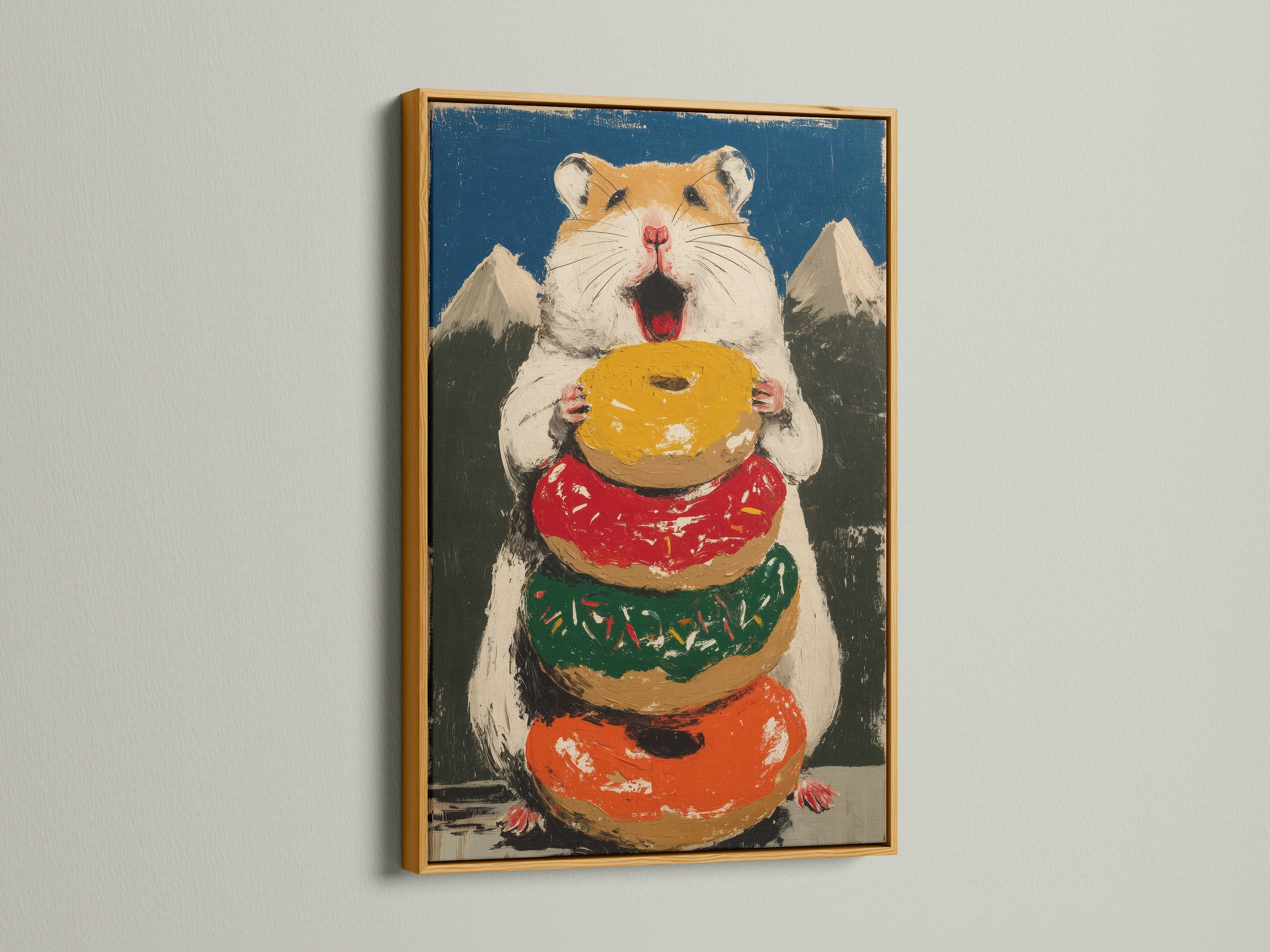 Hamster Donut artwork with a gold frame. The art is perfect for a kitchen or bakery. The artwork features a cute hamster holding a stack of colorful donuts. This contemporary style art is a great gift for pet lovers. Add a quirky touch.