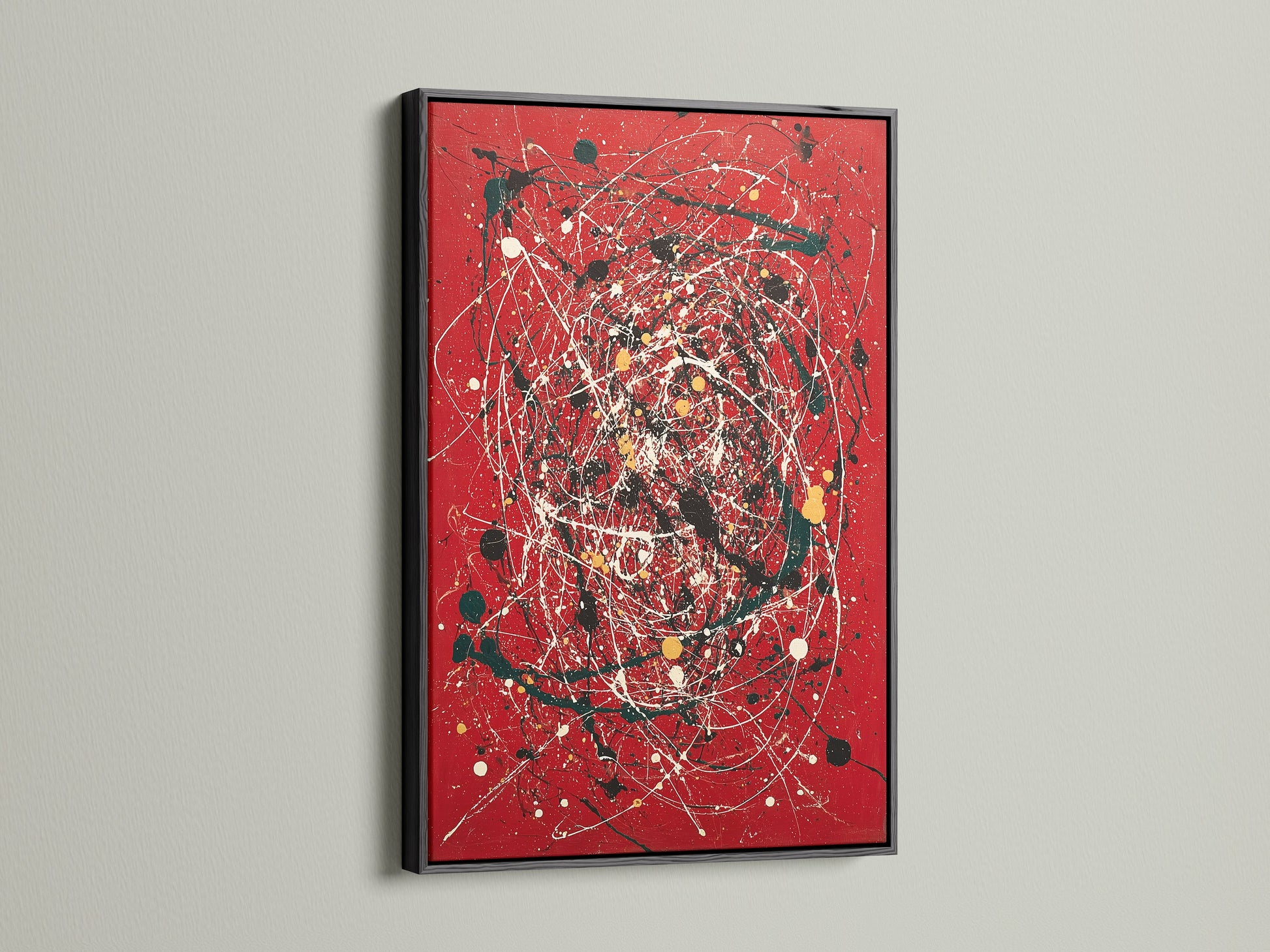 Eye-catching abstract splatter art print on a red canvas. The artwork is elegantly framed in black. The use of paint drip art adds a modern touch. Perfect for contemporary spaces. This bold red art makes a statement in any room. Ideal for modern art enthusiasts.