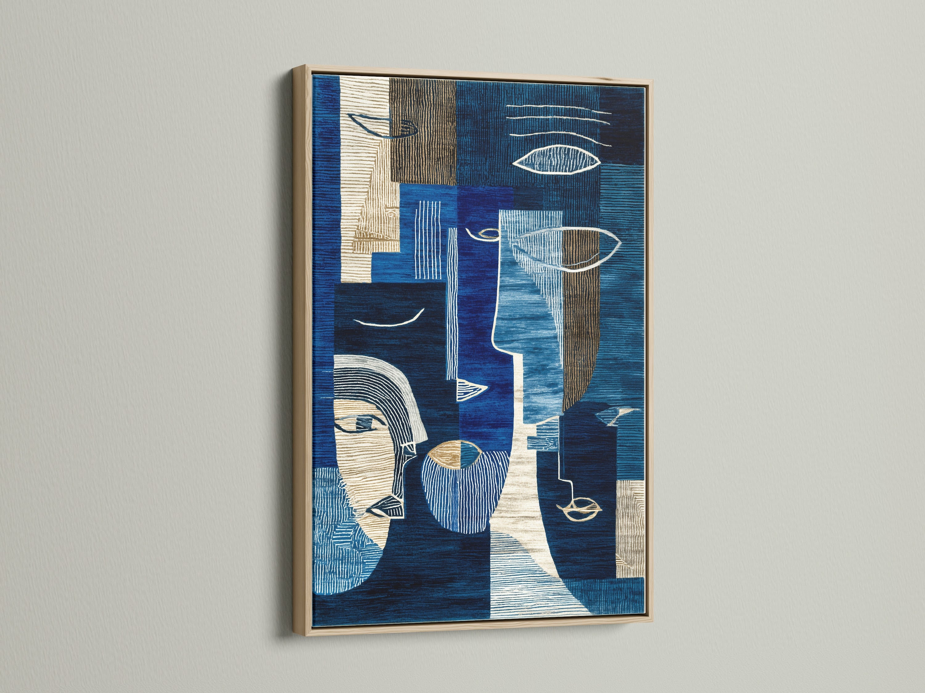 This is an abstract blue art print showcased in an oak frame. The modern geometric canvas wall art adds a touch of sophistication. The navy and cream artwork is ideal for living rooms or collaborative workspaces. Enhance your space with this contemporary print