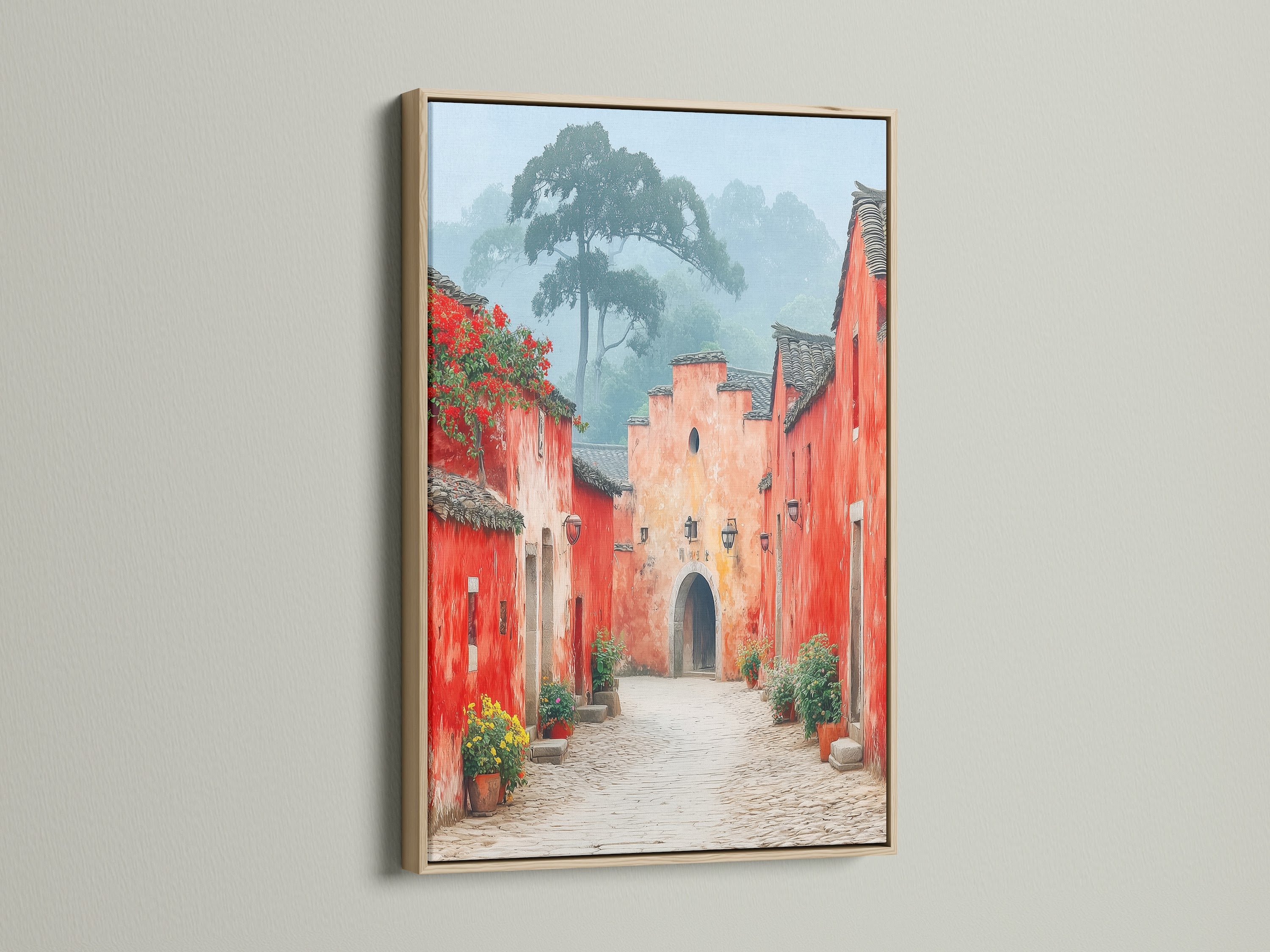 Village Street canvas print in an oak frame. The oak frame enhances the rustic charm of this vintage style art. Perfect for adding a touch of European flair to your entryway or living room.  This art brings warmth to any space.