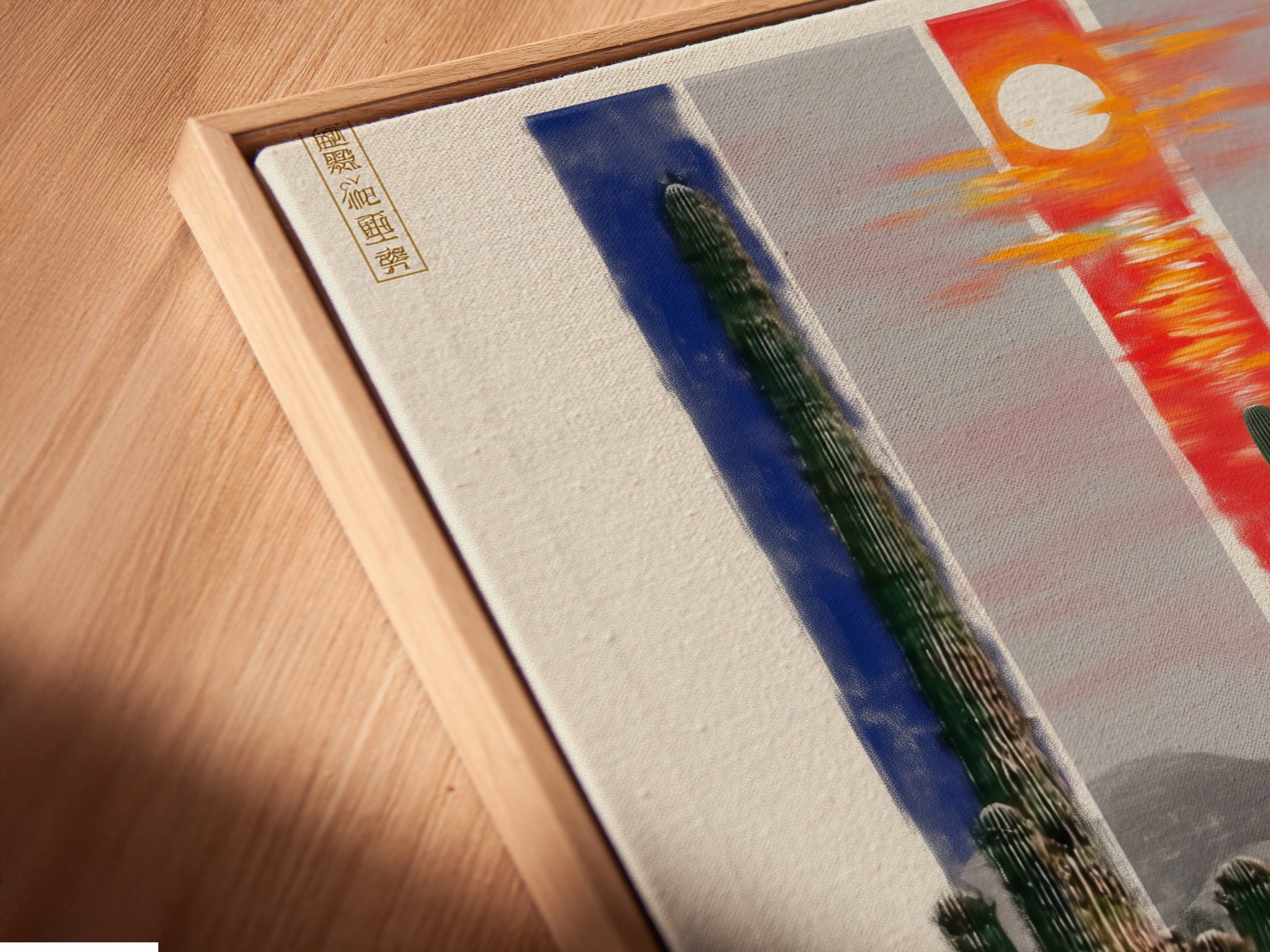 Get a close-up view of a canvas print in a floating frame. The artwork features a desert landscape with cacti. The floating frame gives the piece a modern gallery feel. This southwestern artwork is ready to hang and adds a touch of cowboy charm to your walls.