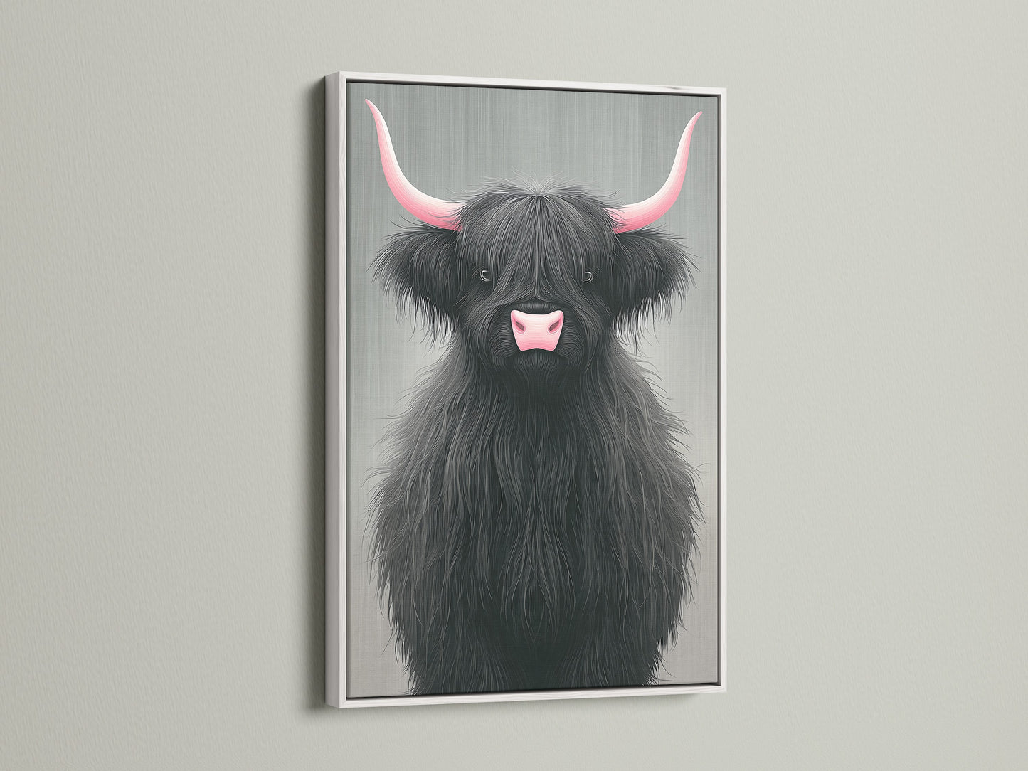 Highland Cow art with pink horns in a white frame. This cute nursery art brings a touch of Scottish charm to your home. The white frame offers a clean modern look. This animal artwork is perfect for any room.