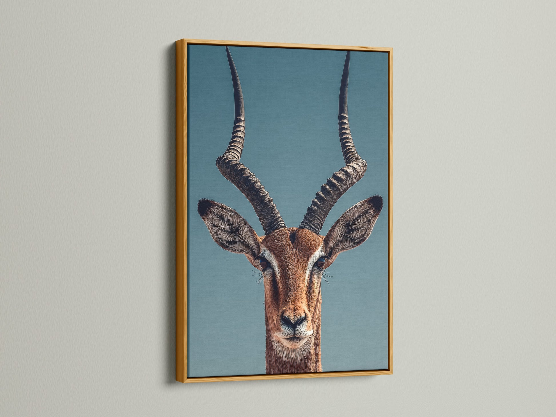 An Impala art print is elegantly displayed. The print is set in a luxurious gold frame. The gold frame adds a touch of glamour. It enhances the artwork with a warm metallic hue.