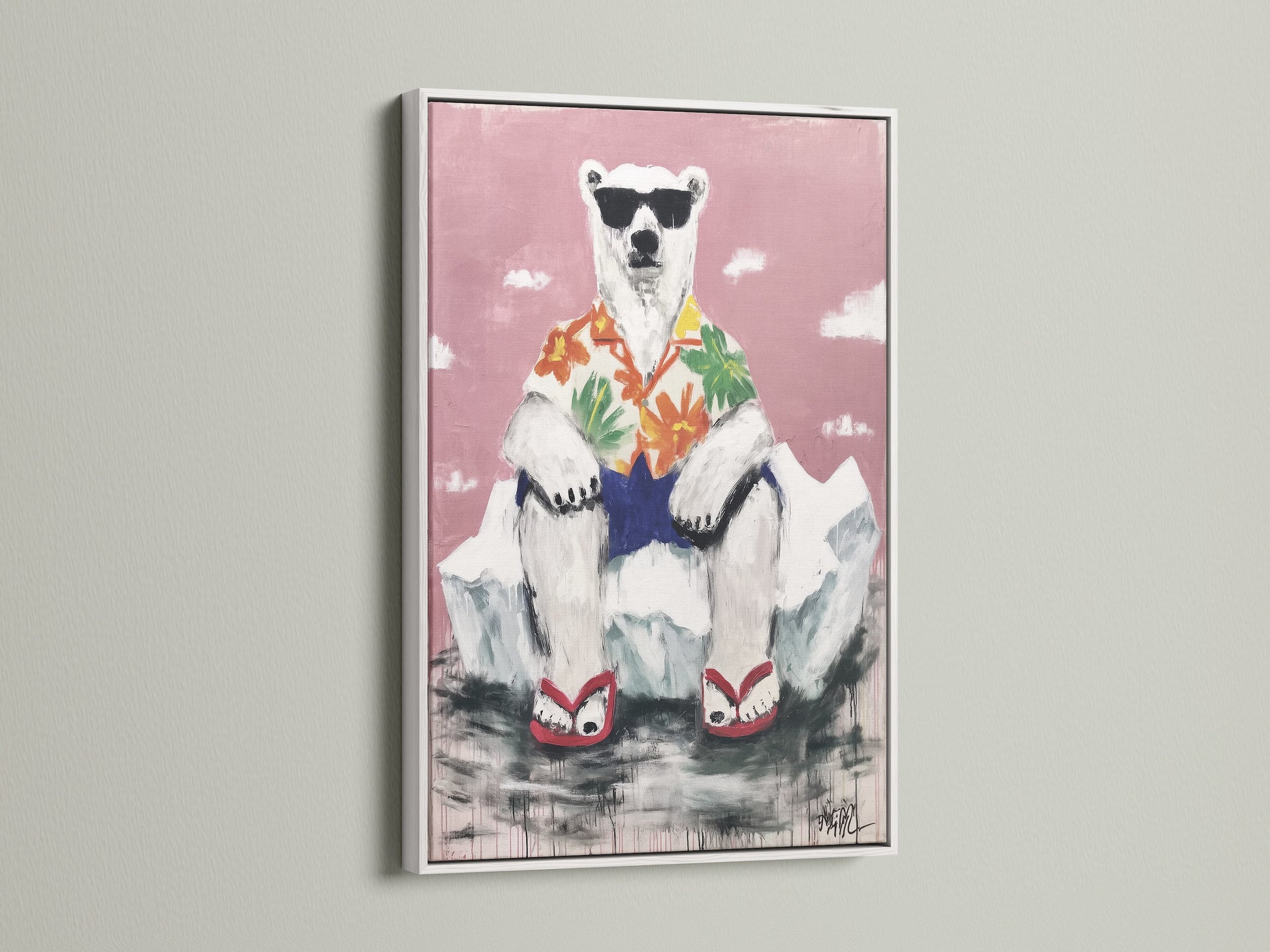 A cool polar bear canvas in a white frame. This tropical wall art is perfect for a nursery. The funny animal print brings playful art to your home. This bear artwork adds a whimsical touch.