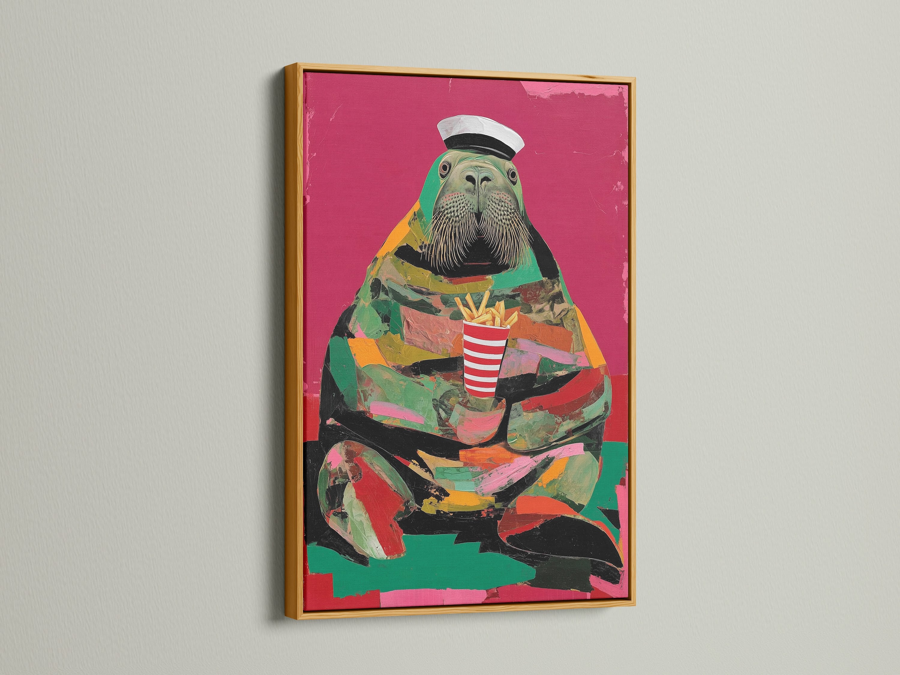 A gold frame showcases the walrus artwork. This pop art canvas adds a touch of humor. It's ideal for kitchen wall art or cafe decor. The marine animal art features vibrant colors pink and green.
