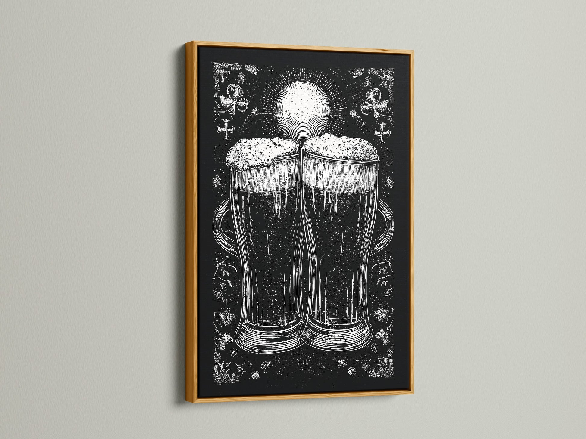 A framed artwork is on display. The art is in a gold frame. The artwork features a monochromatic illustration of two beer glasses. The beer glasses are the focal point. The print adds a touch of elegance to any room. The gold frame brings a touch of luxury.