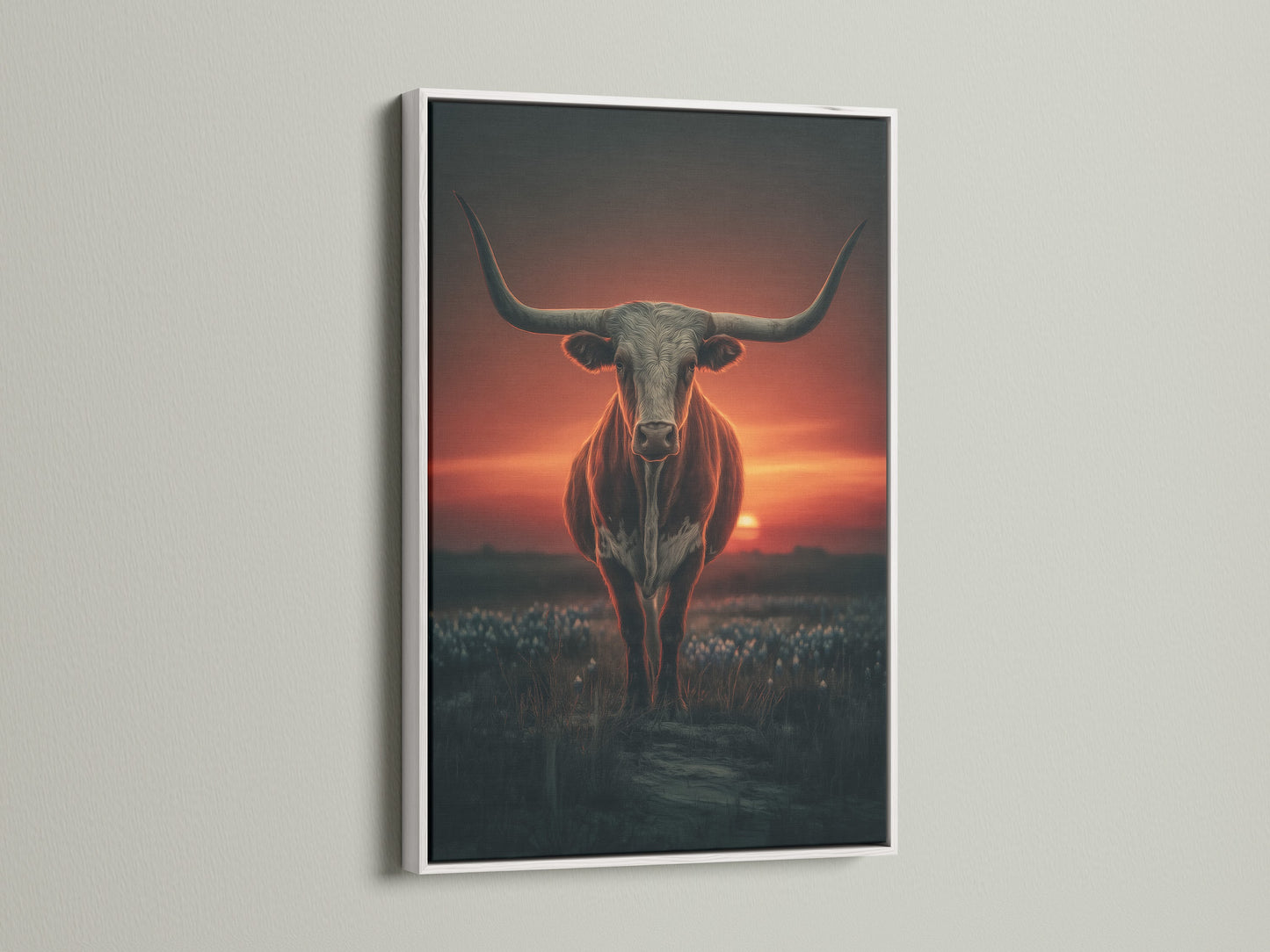 Longhorn bull artwork displayed in a white frame. This western wall art features a beautiful sunset. It brings a touch of country charm to any space. The white frame enhances the dramatic animal photography. Perfect for rustic home decor.