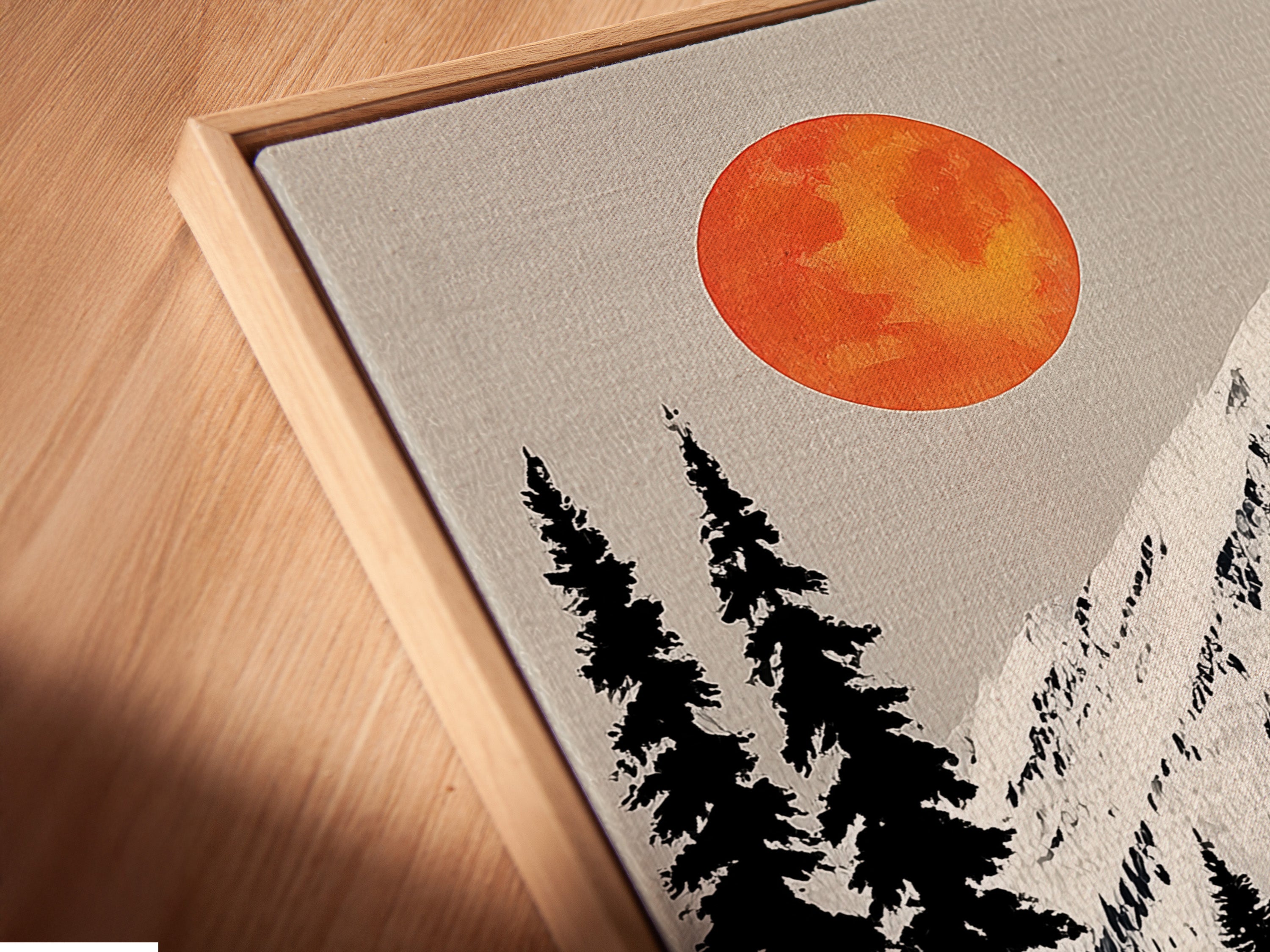 Angled close up of a canvas print in a floating frame. The mountain ski lift artwork is beautifully displayed. This adds a modern touch to the alpine landscape. Perfect for cabin decor and winter sports art. The floating frame enhances the artwork's visual appeal.