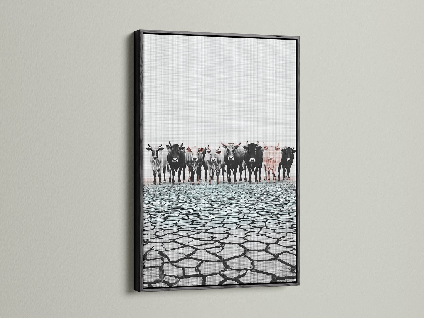 Cattle canvas print in a black frame. This rustic wall art complements any space. Black frame enhances the black and white animal canvas. Elevate your decor with black framed art.