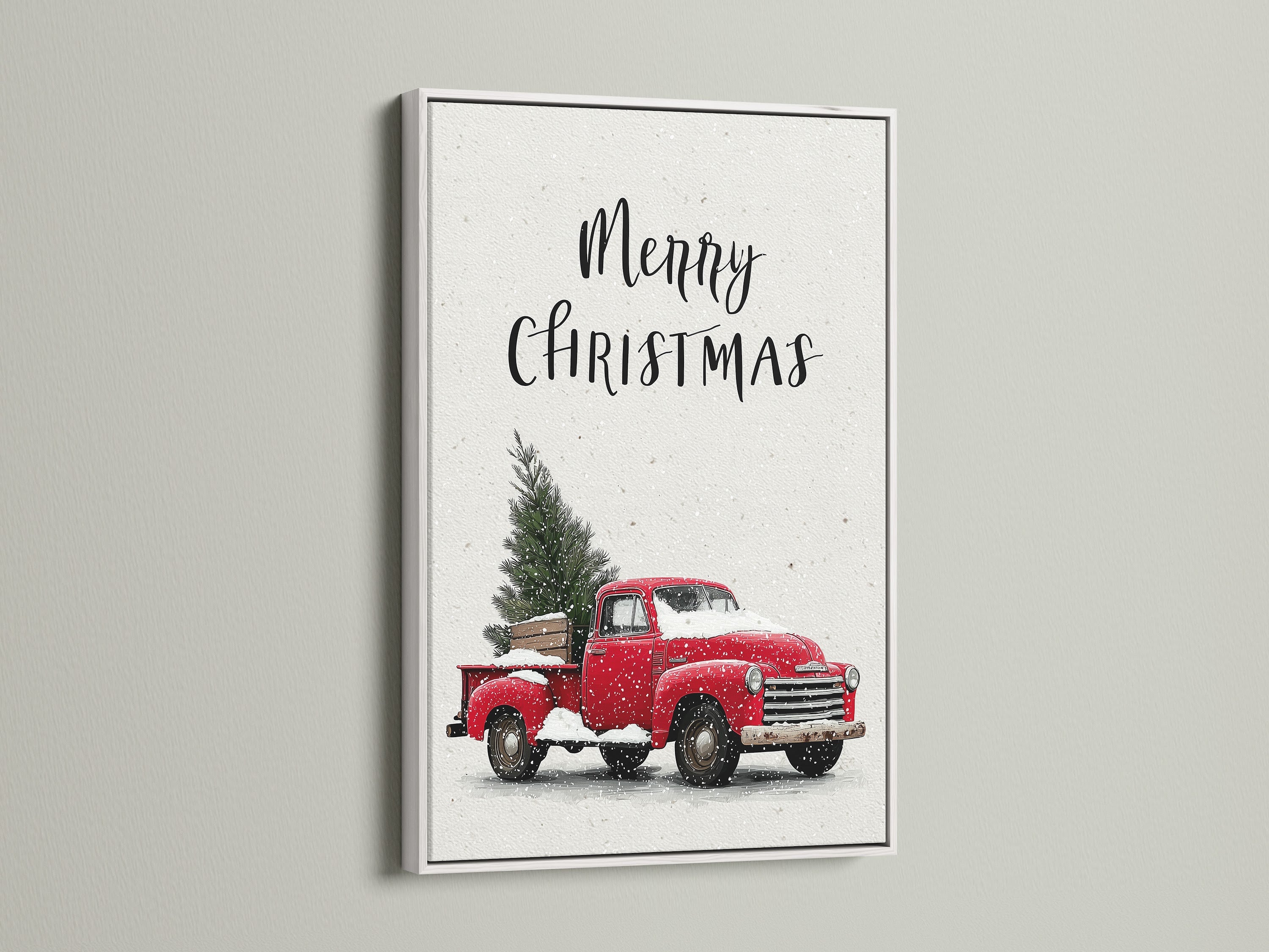 Artwork featuring a white frame. The artwork showcases a Christmas scene. A red truck is carrying a Christmas tree covered in snow. The white frame offers a clean modern look. It enhances the artwork's vibrant colors. This art is perfect for seasonal home decor.