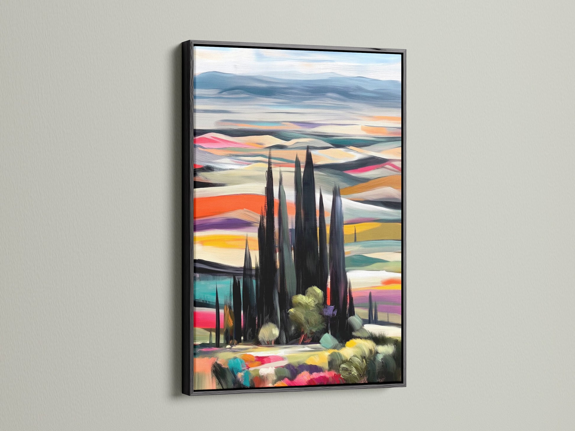 A modern Tuscan Landscape artwork is elegantly framed in black. This Italian art print features cypress trees and a colorful countryside. The black frame adds a touch of sophistication. Perfect for living room wall art or bedroom wall decor. Bring the beauty of Tuscany to your home.