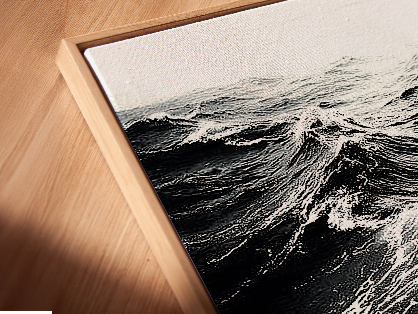 Angled close up of a canvas print in a floating frame. The floating frame gives the artwork a modern gallery look. Perfect for displaying fine art. Discover our range of framed art prints today for your home decor.