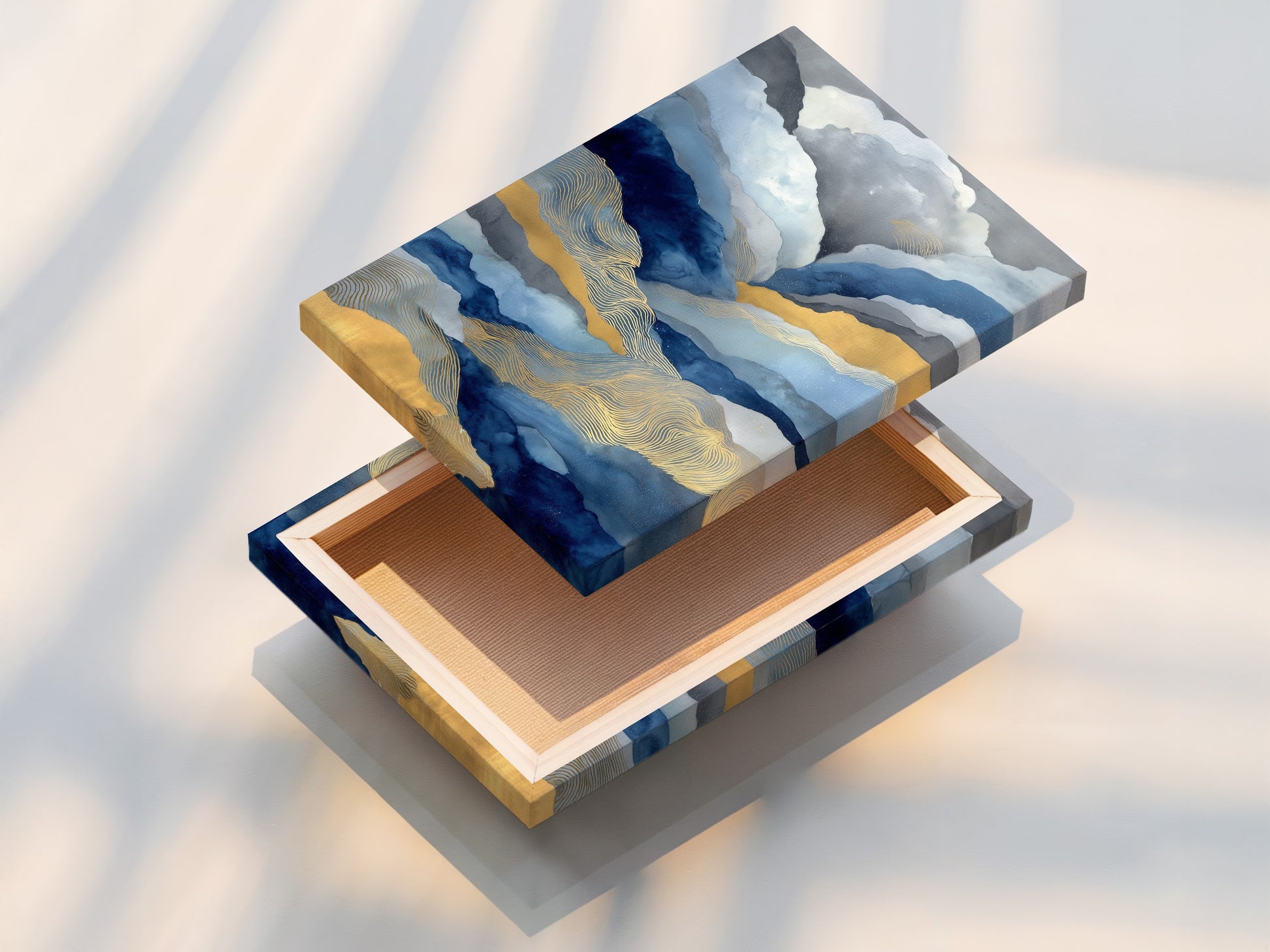Stretched canvas print of abstract mountain artwork. The blue and gold landscape adds modern nature to your walls. Perfect for living rooms bedrooms offices lobbies studios clinics and spas. Enhance your space.