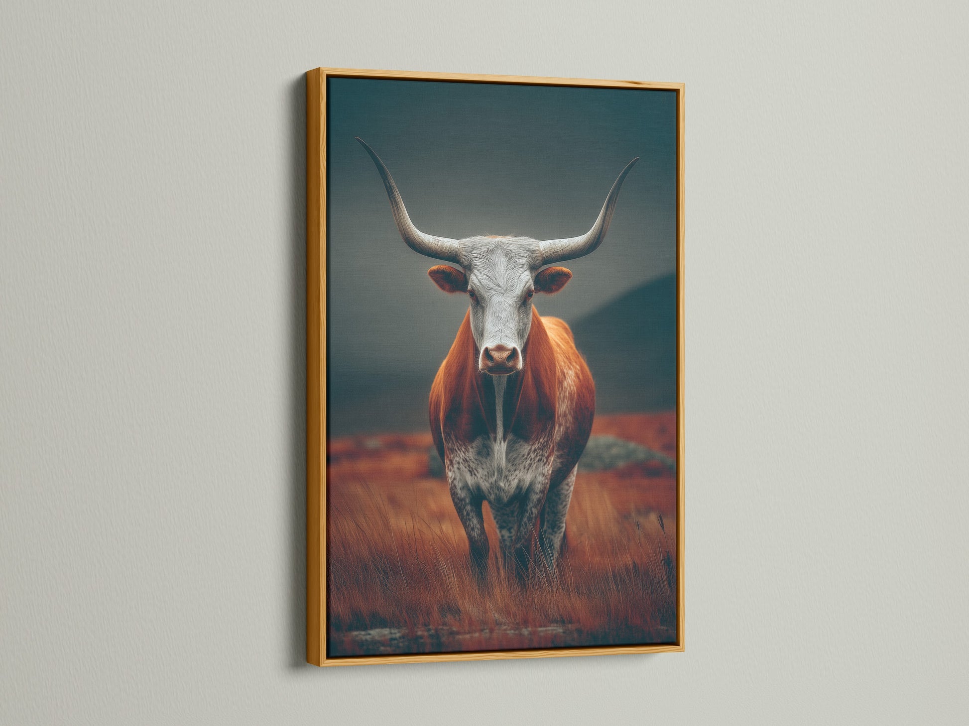 A gold frame adds a touch of elegance to this rustic Highland Cow artwork. The metallic finish complements the warm tones in the artwork. It creates a luxurious feel. This Scottish Cow print is perfect for adding a touch of glam to your farmhouse decor