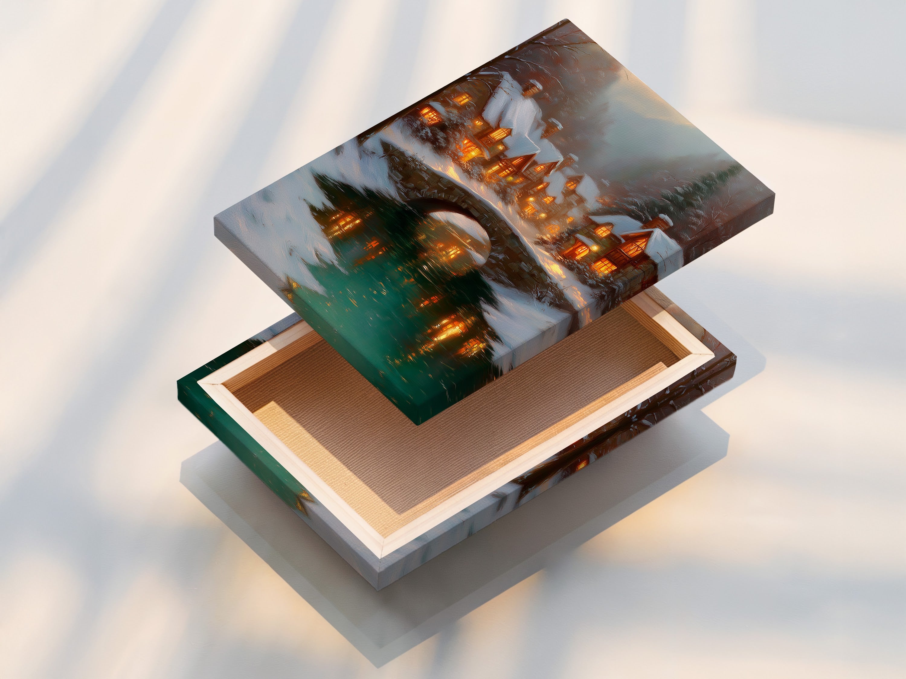 This is a stretched canvas print of the Winter Village artwork. The snowy cottage print features a charming bridge landscape. Ideal for living room wall art or bedroom wall decor. This cozy cabin art adds warmth to any space. Perfect for holiday decor.