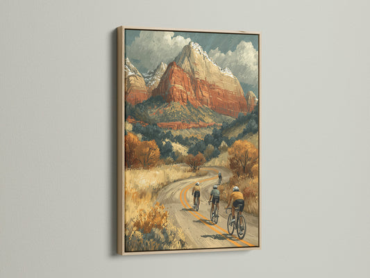 Cycling art print in an oak frame. This mountain wall art makes a great gift. Vintage poster art complements rustic mid-century or eclectic styles. The adventure canvas print is perfect for a living room.