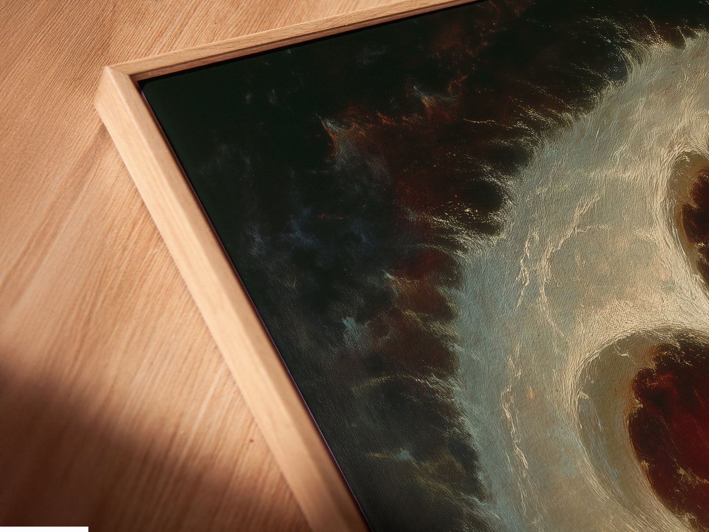 A close-up angled view of the Celestial Vortex canvas print in a floating frame. The abstract galaxy wall art is perfect for library wall art. The moody tones make a unique focal point. It is a great gift for students.