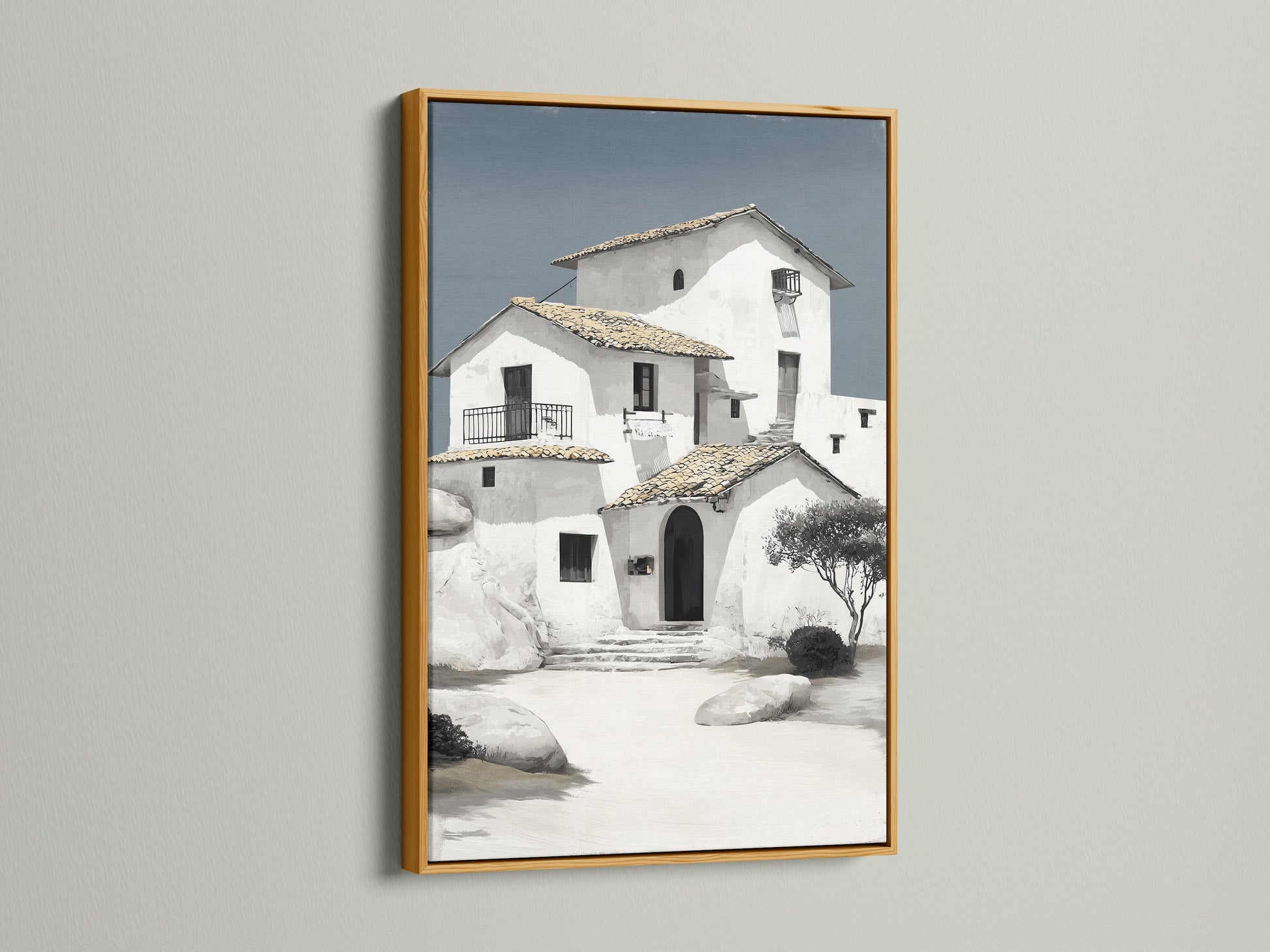 Mediterranean house canvas print with a gold frame. This coastal architecture wall art adds a touch of elegance to any space. The minimalist white building art is perfect for office wall decor. Explore our range of European art prints today. Shop now.