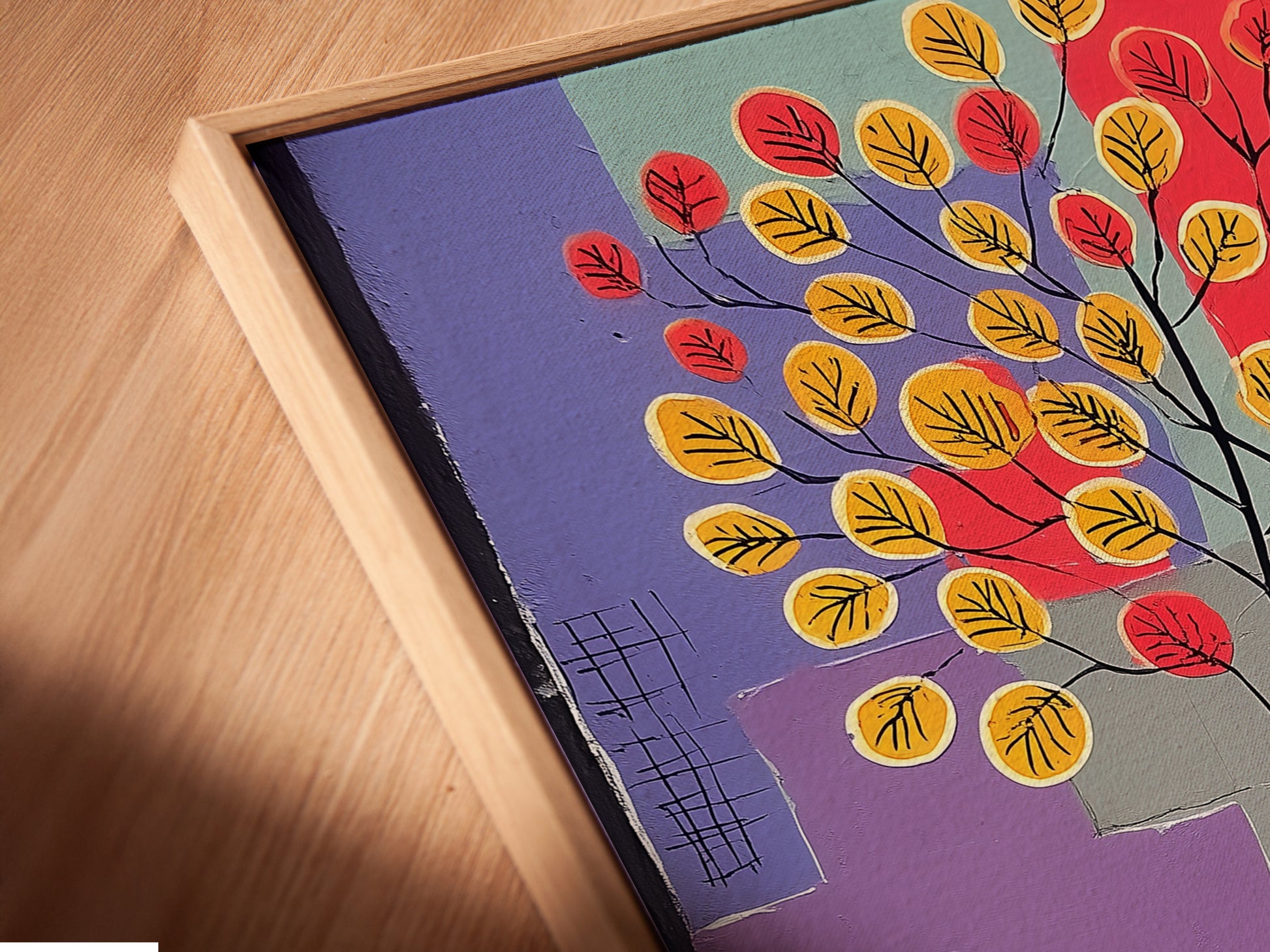 Close-up of a canvas print in a floating frame. The floating frame gives the artwork a sophisticated look. Perfect for modern interiors. The abstract tree art features a geometric design. The art is a great choice for homeowners and interior stylists.