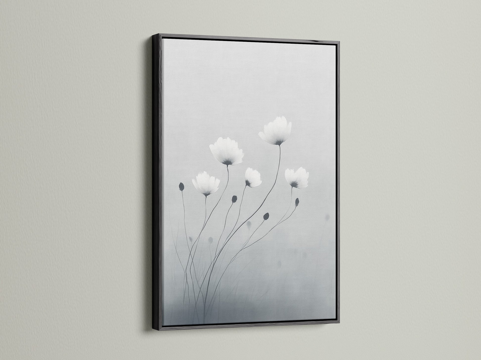 Enhance your decor with minimalist flower artwork in a black frame. The gray and white botanical wall art stands out beautifully. This modern canvas art is ideal for adding sophistication to your space. Black frames add a bold touch to neutral art pieces.