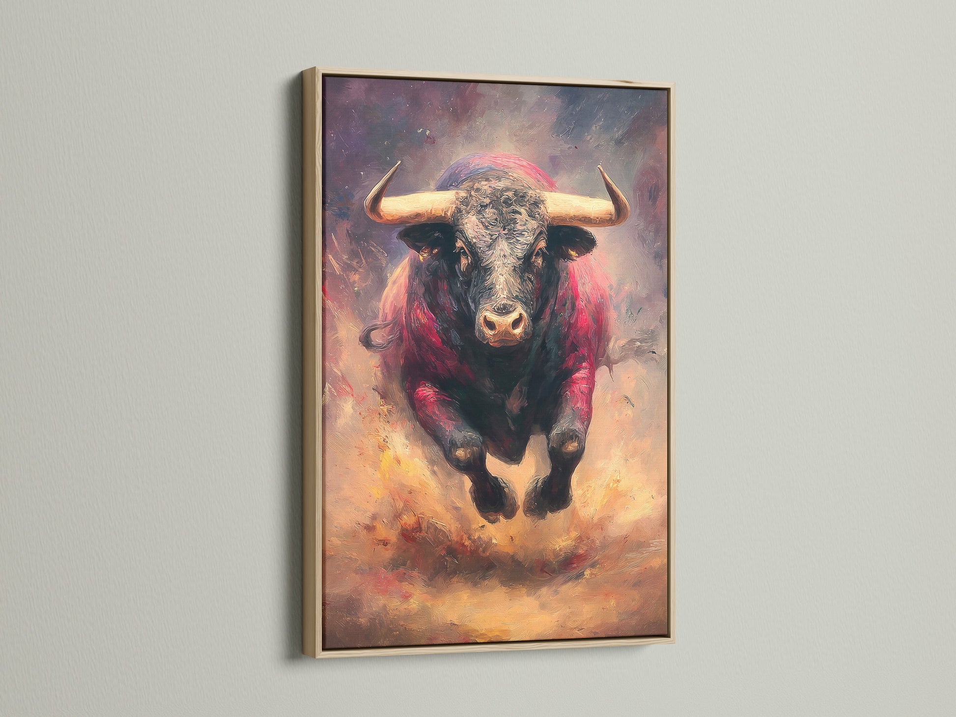 The oak frame surrounds a striking bull artwork. The artwork is a beautiful addition to any home. The oak frame adds warmth and complements the artwork. View this framed artwork now to elevate your space.