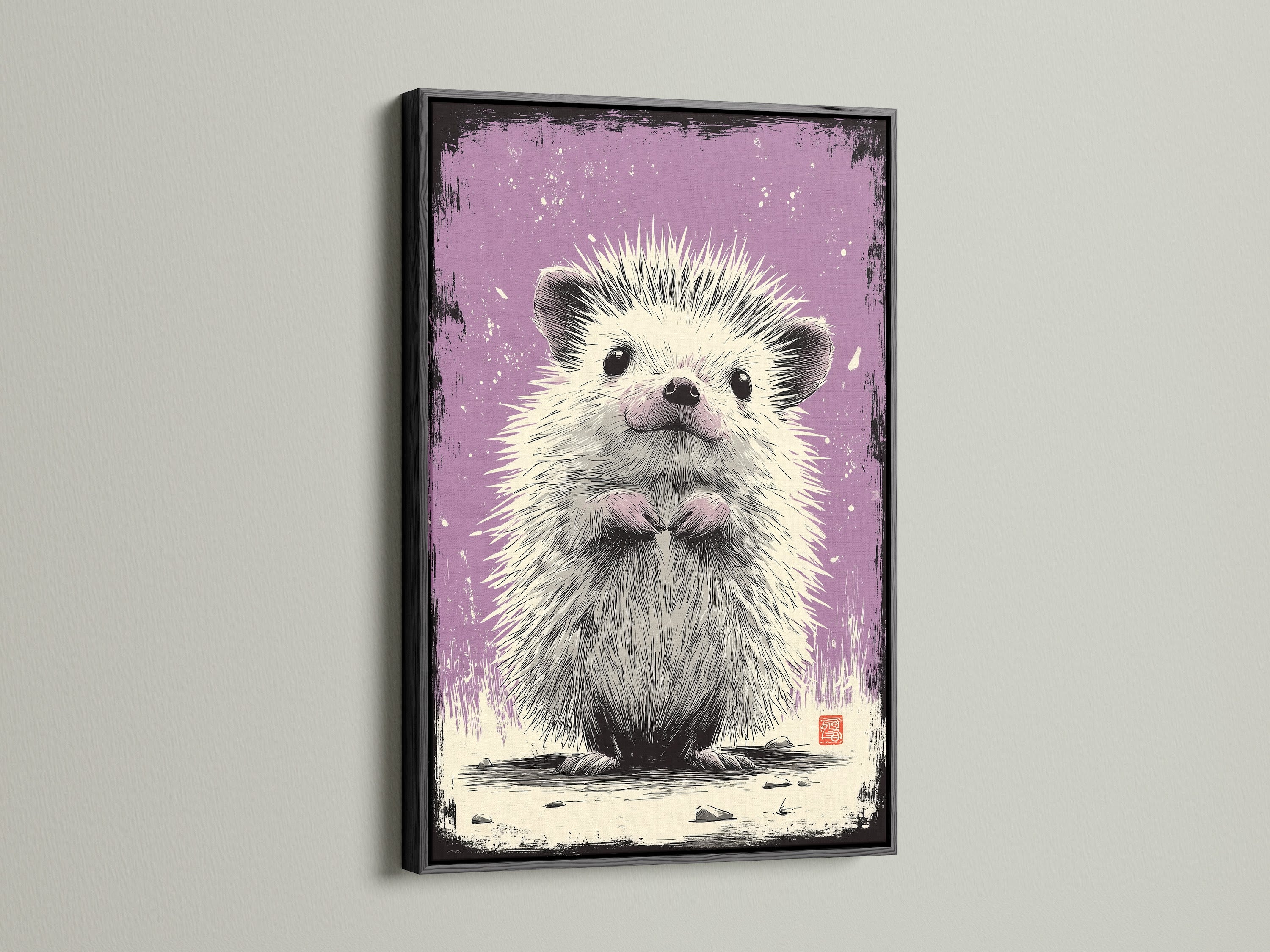 The artwork shows a cute hedgehog in a black frame. The black frame gives a bold look. It contrasts well with the artwork. This framed artwork complements various styles. A great choice for contemporary spaces. The art brings charm and character.