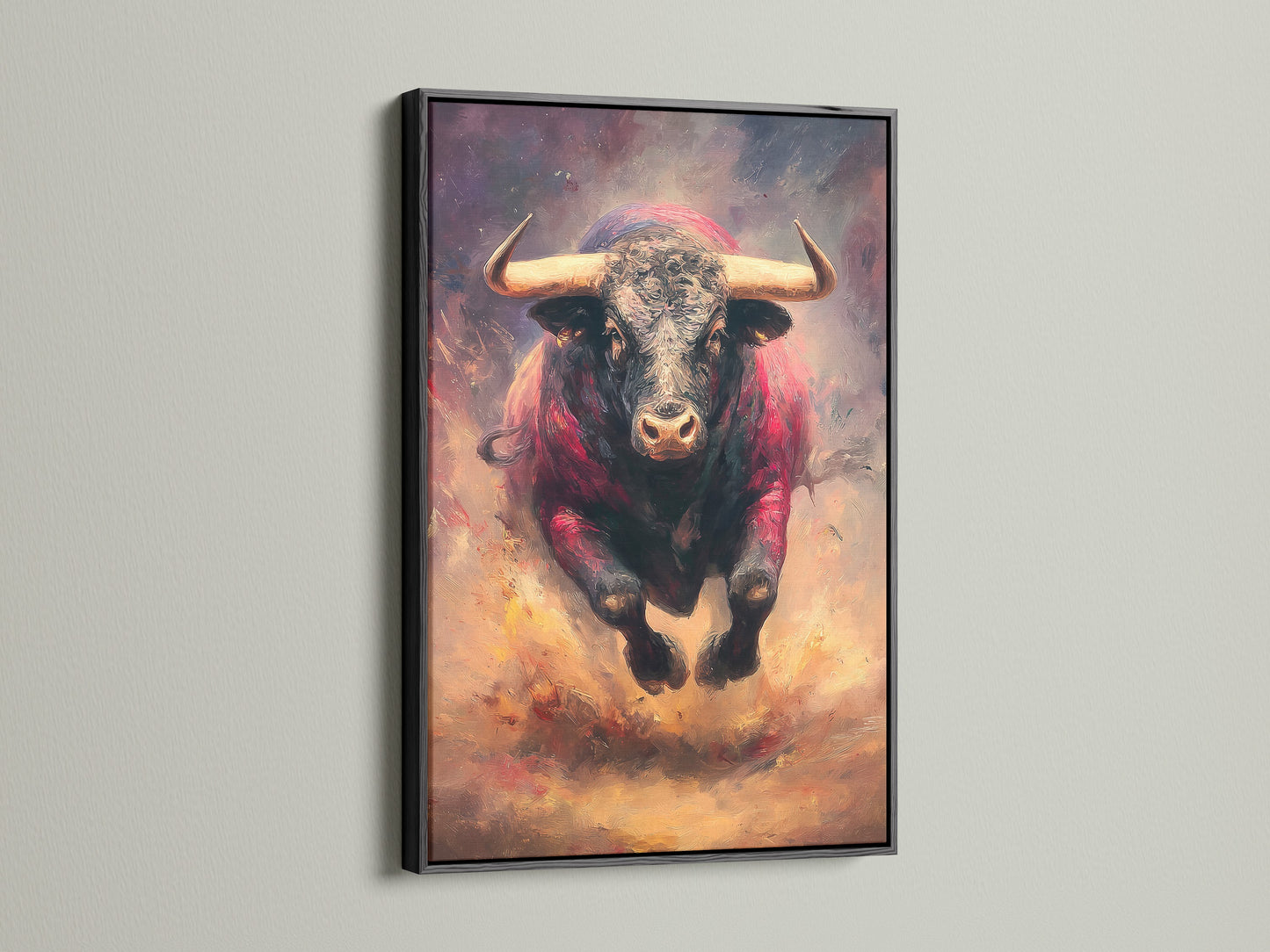 A bold bull artwork is encased in a black frame. The artwork makes a statement in any setting. The black frame adds a touch of sophistication. See how framed art can enhance your home decor today.