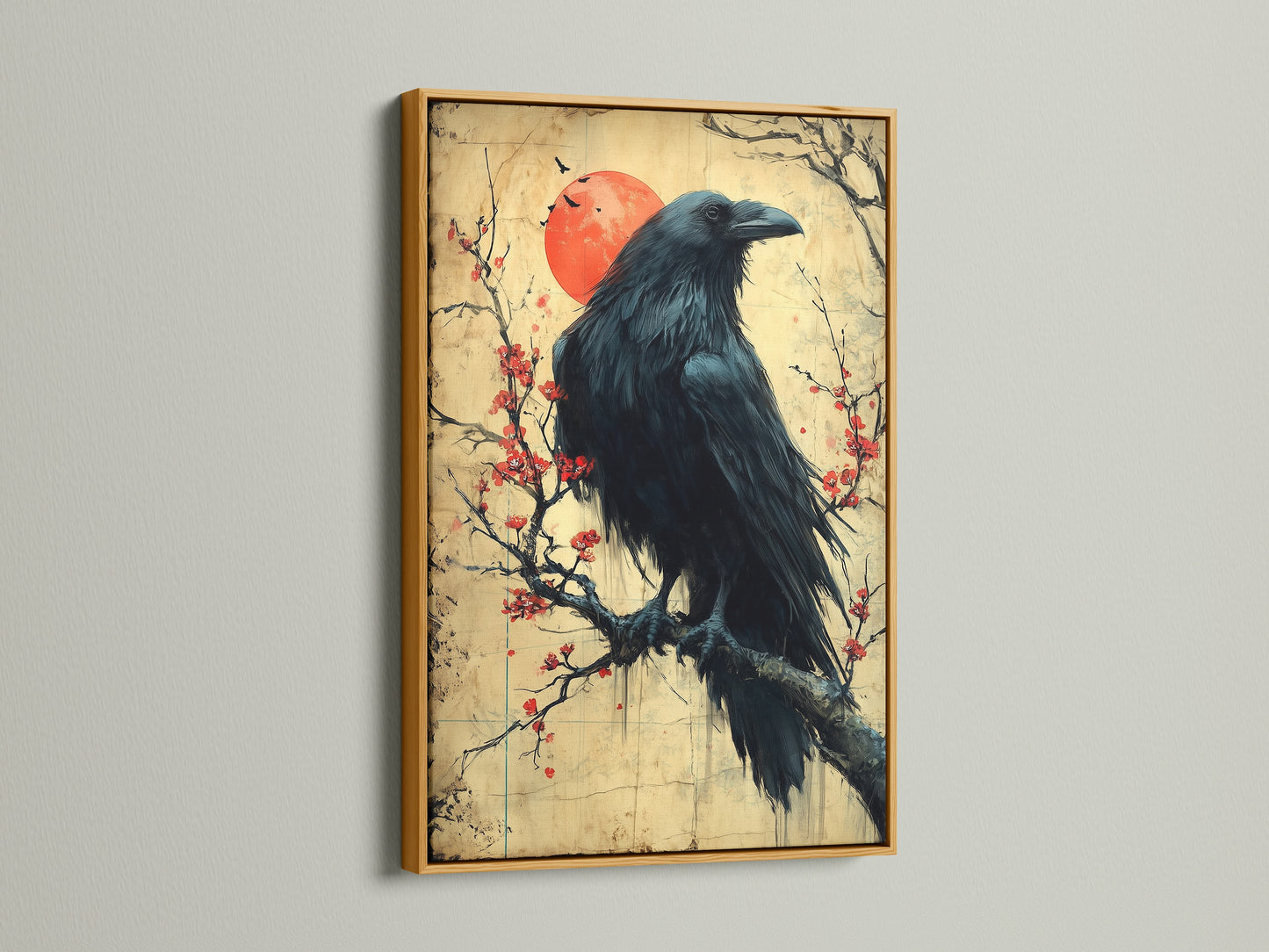Raven Canvas Print with a Gold Frame. This Japanese art wall decor features a bird on a cherry blossom branch. The crow artwork adds a touch of zen. This zen wall art is perfect for office decor.
