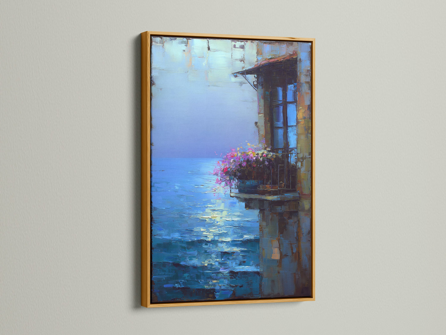 The gold frame adds a touch of elegance. This is a Mediterranean Balcony artwork. The art print is a beautiful blue wall art piece for living rooms or vacation rentals.