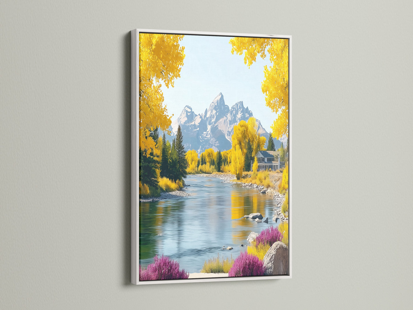 Mountain river artwork with autumn landscape in a white frame. The canvas print features yellow trees and a serene river. This nature print adds a touch of elegance to your home wall decor. It enhances any living space.