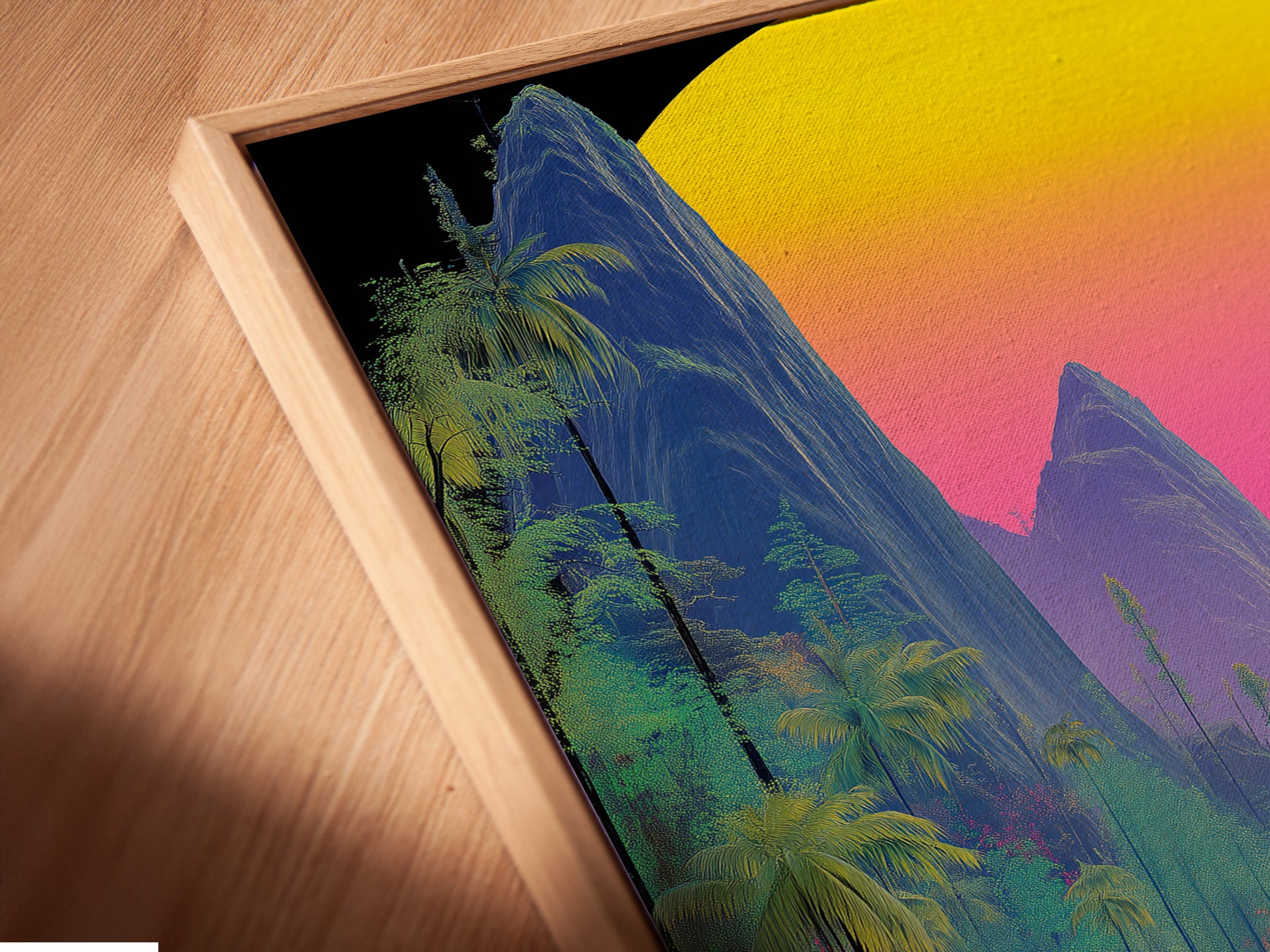 A close-up shot shows a canvas print in a floating frame. The tropical mountain artwork features a vibrant vaporwave sunset. This cyberpunk nature poster is perfect for modern decor. Add a touch of summer to your walls with this stunning piece.