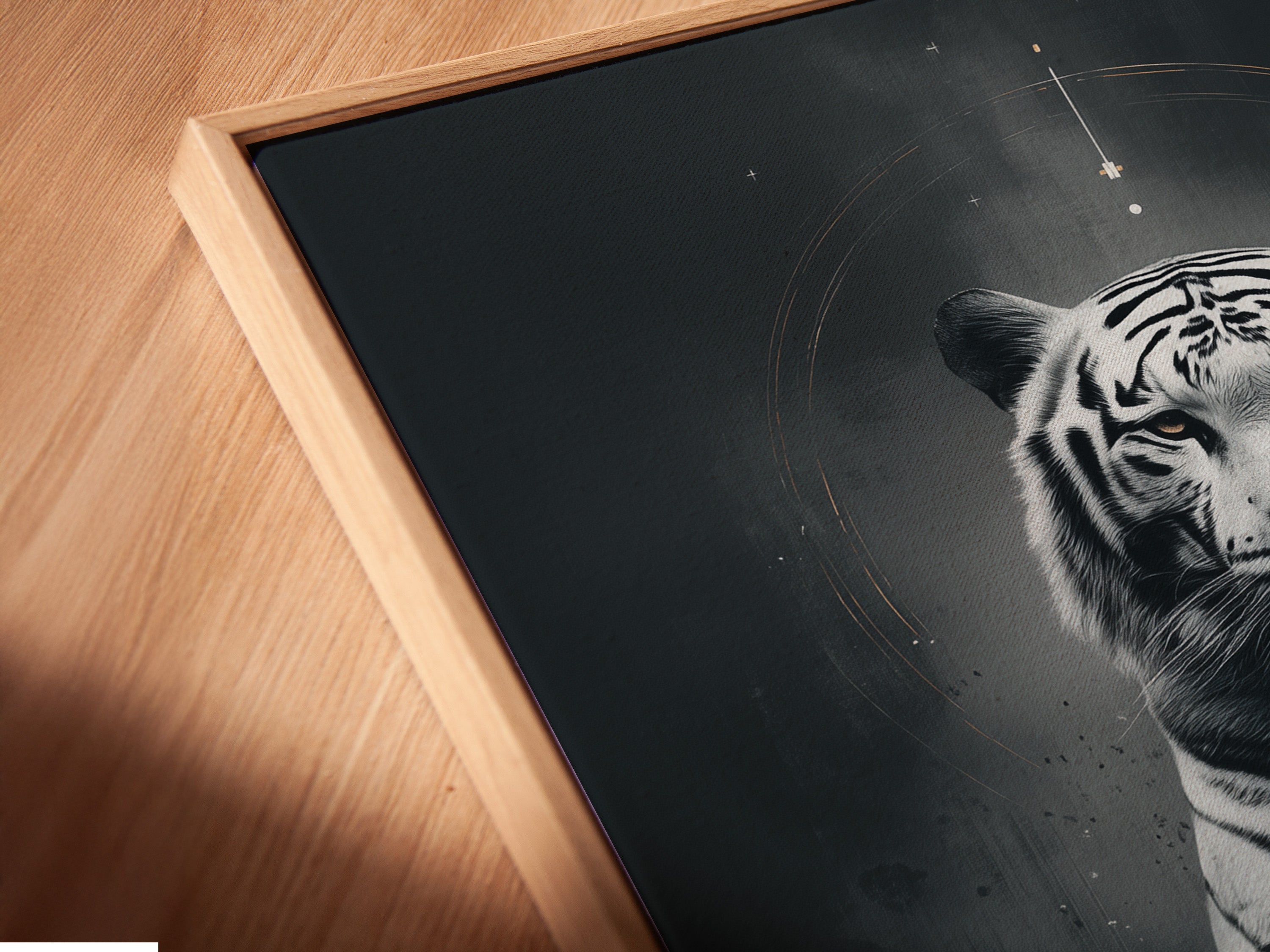 Close-up angled view of a canvas print in a floating frame. This mystical tiger art adds a unique touch to your space. The celestial animal and moon phases create a spiritual ambiance. A great choice for modern wall decor.