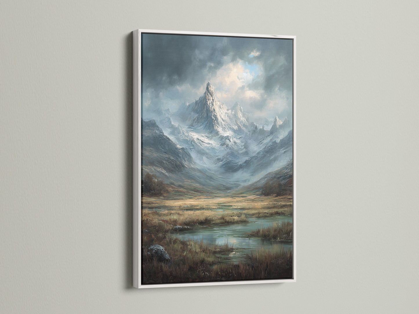 Artwork in a white frame hangs on a wall. The white frame offers a clean and modern look. The artwork showcases a breathtaking mountain landscape. The white frame makes the art stand out. This piece is perfect for adding a touch of elegance to your space.