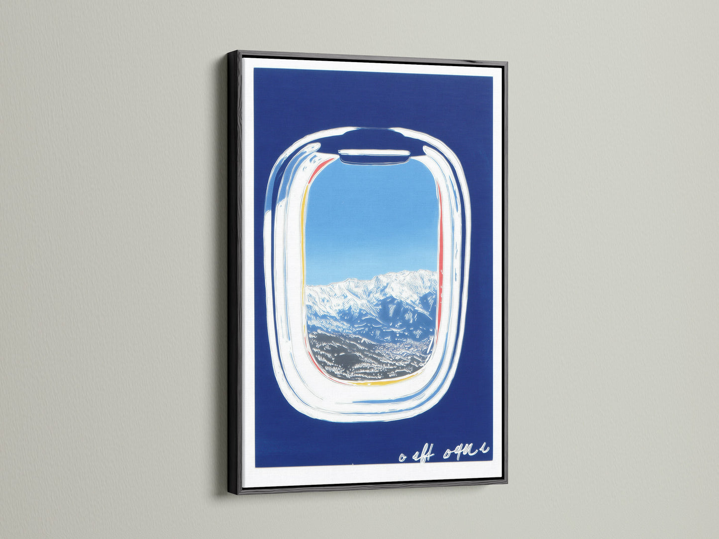 Artwork featuring an airplane window view in a black frame. The print offers a scenic landscape with snow-capped mountains and a blue sky. This modern travel art is a wanderlust decor piece. A unique aviation art piece.