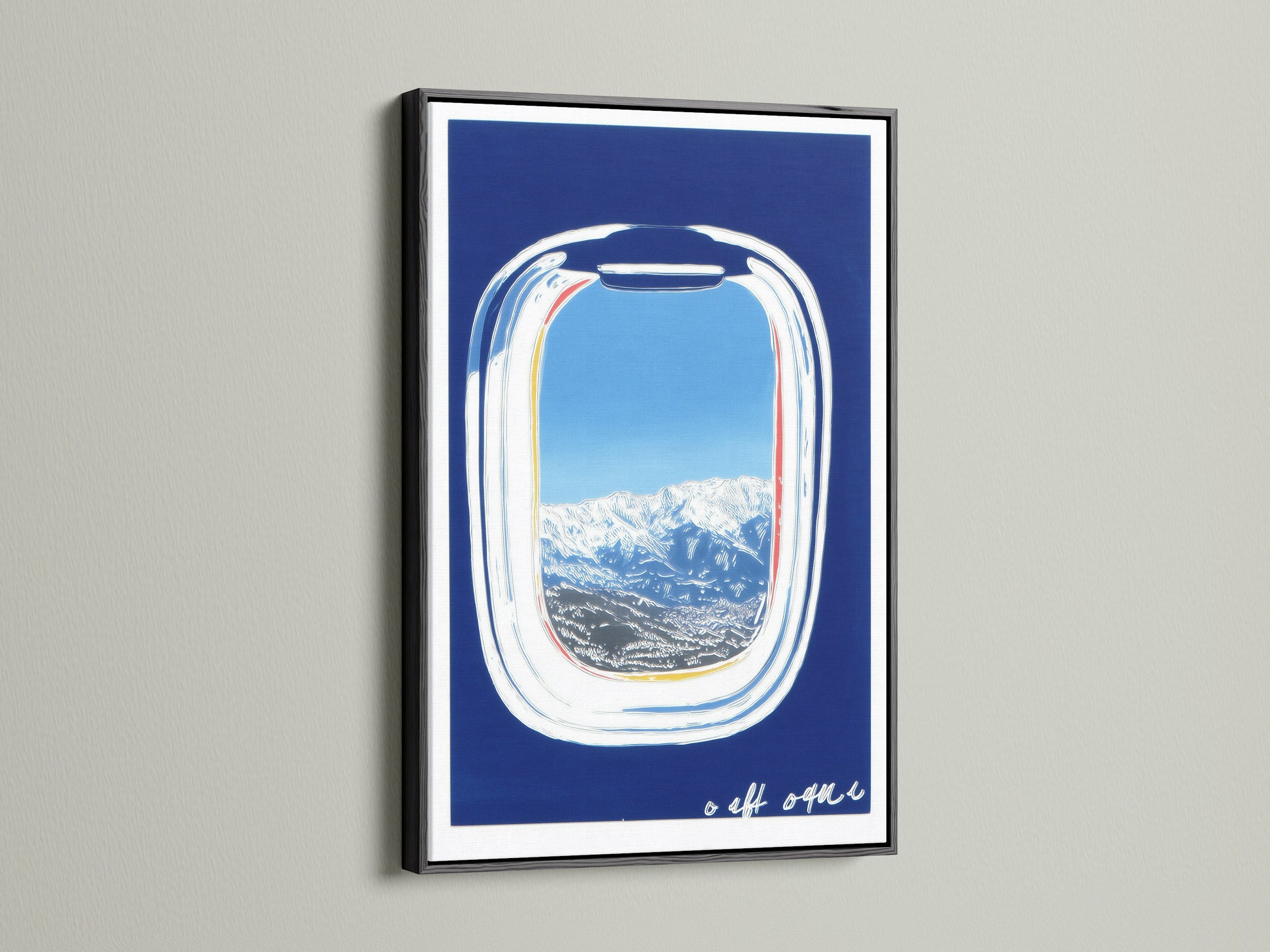 Artwork featuring an airplane window view in a black frame. The print offers a scenic landscape with snow-capped mountains and a blue sky. This modern travel art is a wanderlust decor piece. A unique aviation art piece.