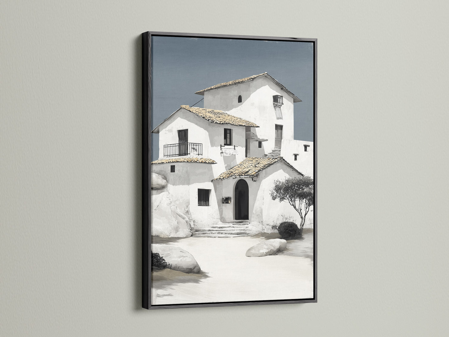 Minimalist Mediterranean house art in a sleek black frame. The coastal architecture wall art is a statement piece for any room. The white building art complements office decor and home settings. Browse our selection for elevated neutral home art today.