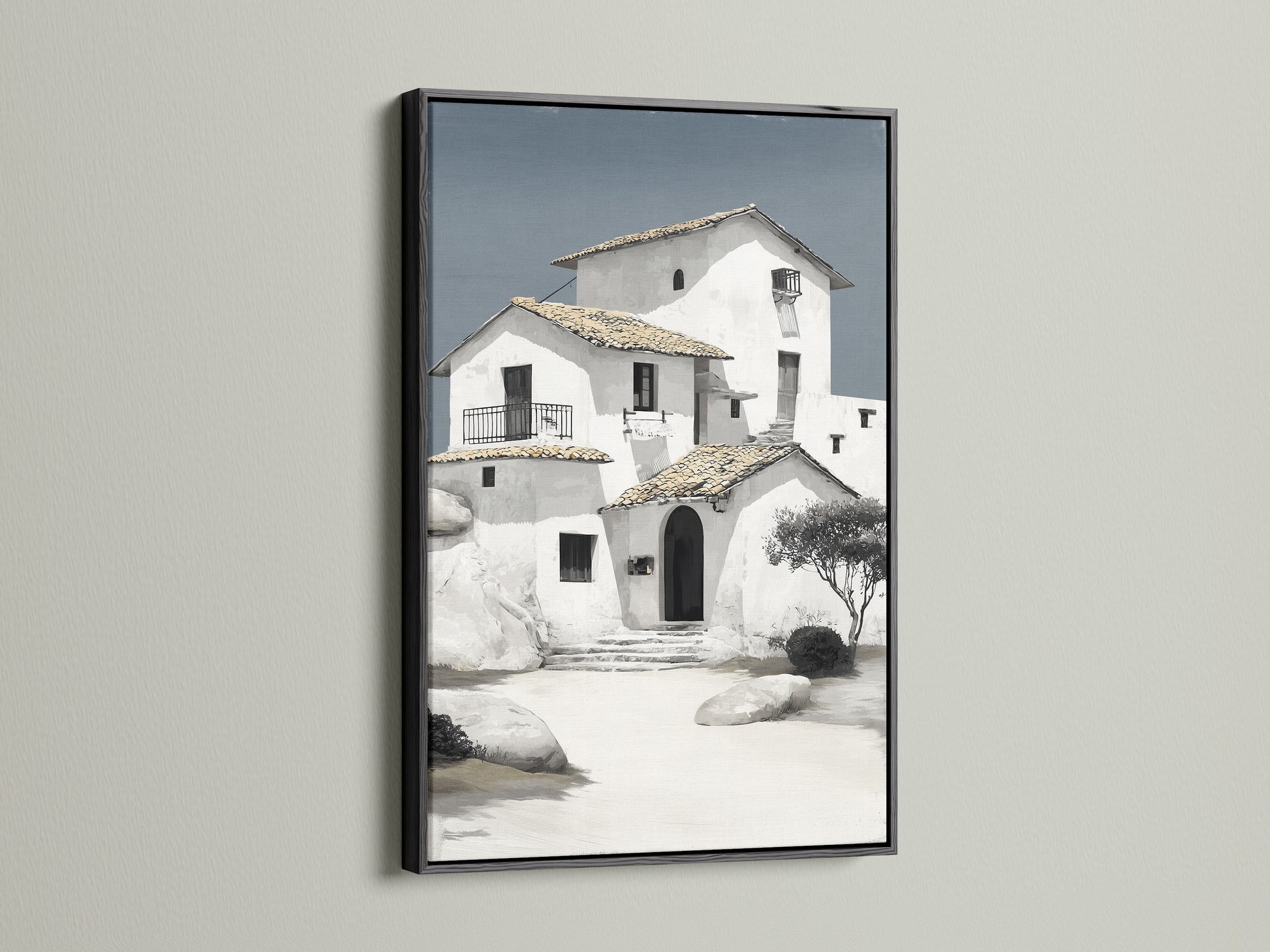 Minimalist Mediterranean house art in a sleek black frame. The coastal architecture wall art is a statement piece for any room. The white building art complements office decor and home settings. Browse our selection for elevated neutral home art today.