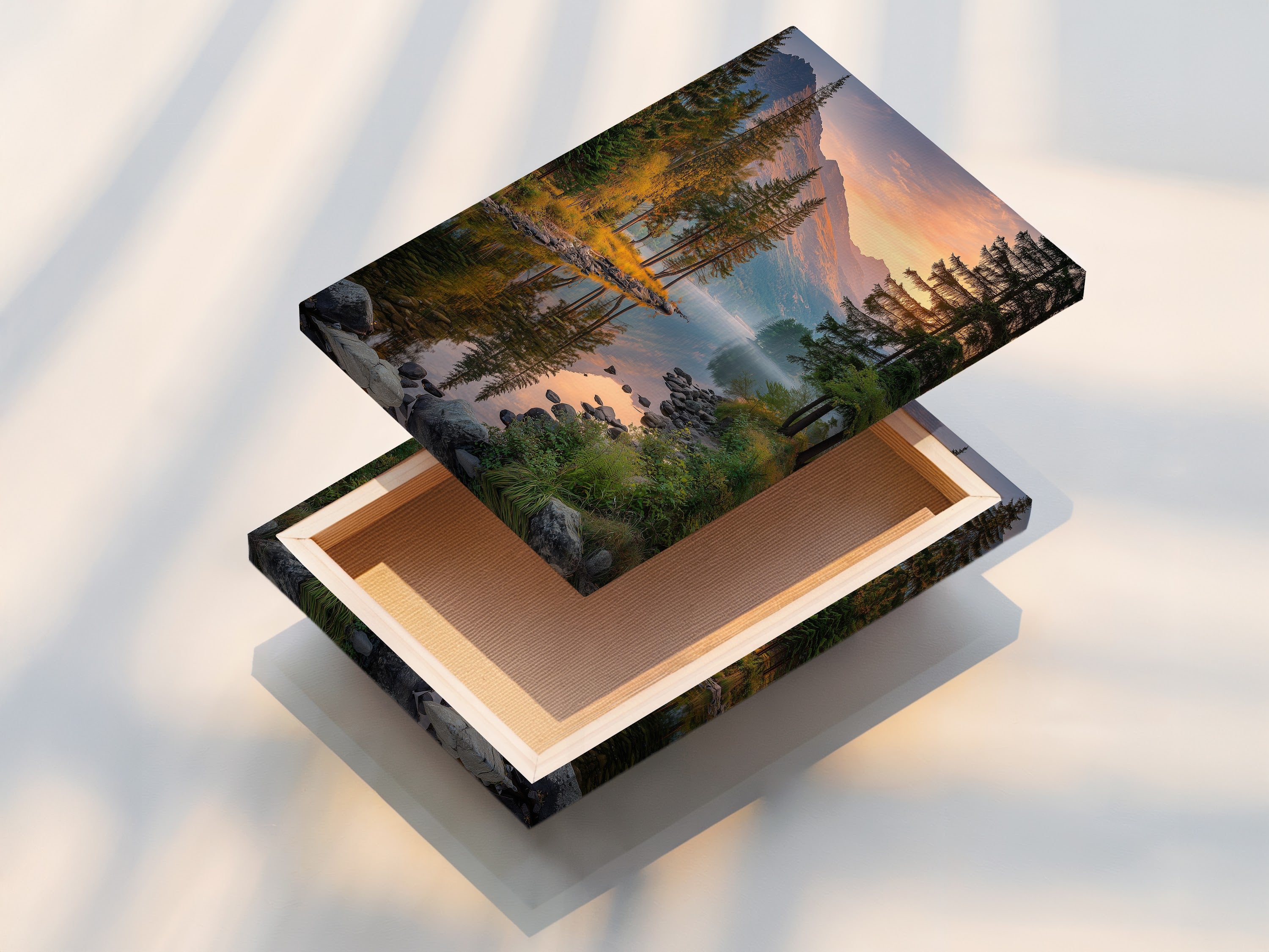 Stretched canvas print of a mountain lake landscape. This landscape artwork features a serene lake reflecting the surrounding mountains and forest. Ideal for adding a rustic touch to your living room or cabin decor. Enjoy the peaceful art and scenic beauty of this nature print.