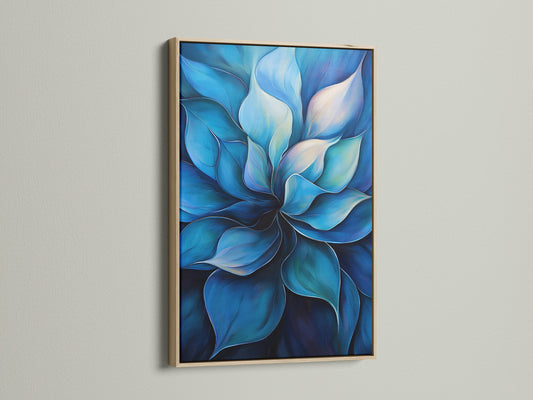 A close-up of a blue flower artwork is on display. The artwork is framed with a light oak frame. This botanical canvas print adds a touch of nature to any space. The light oak frame enhances the artwork's contemporary style. It is ideal for minimalist or Scandinavian interiors.