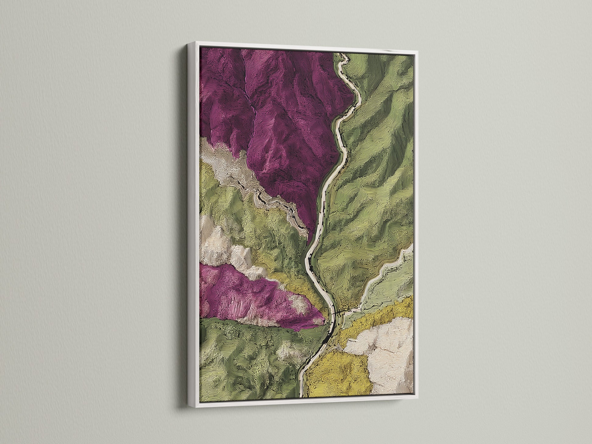 This artwork is framed in a clean white frame. It is displayed against a neutral wall. The topographical map features stunning purple and green areas. The artwork is a sophisticated touch to any room. The white frame offers a modern aesthetic. This is a perfect choice for contemporary homes.