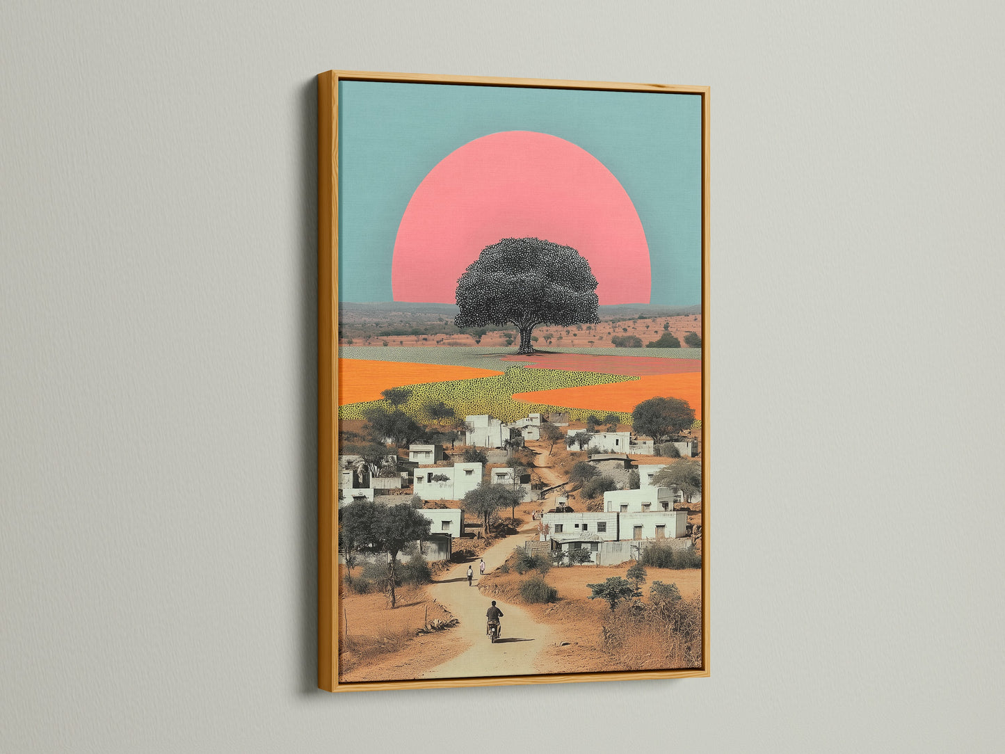 The Indian Village Canvas artwork print is luxuriously displayed in a gold frame. The metallic finish complements the warm tones and ethnic decor elements of the artwork. Ideal for enhancing living rooms offices and boho style settings.