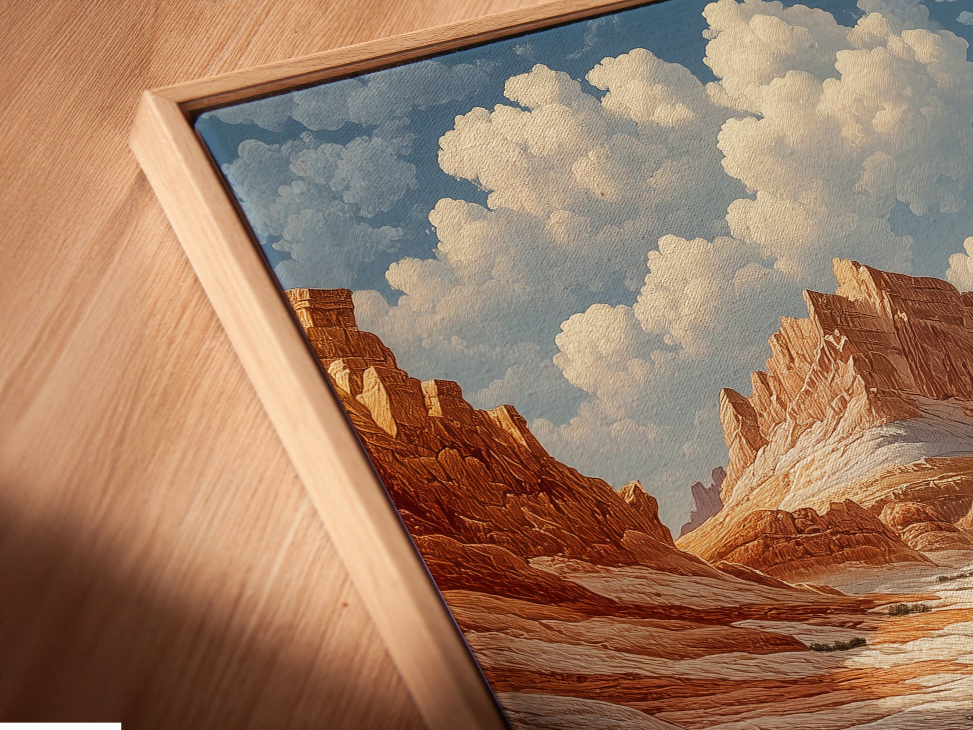 Experience the beauty of southwest decor with this angled close-up of a canvas print in a floating frame. The desert canyon art features terracotta mountains. The floating frame enhances the artwork creating a sophisticated look for any room. Perfect for living room or bedroom wall art.